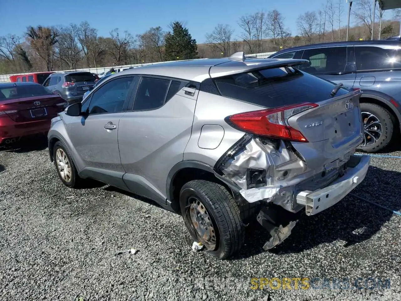 2 fotografías del automóvil dañado NMTKHMBX3KR098328 TOYOTA C-HR 2019