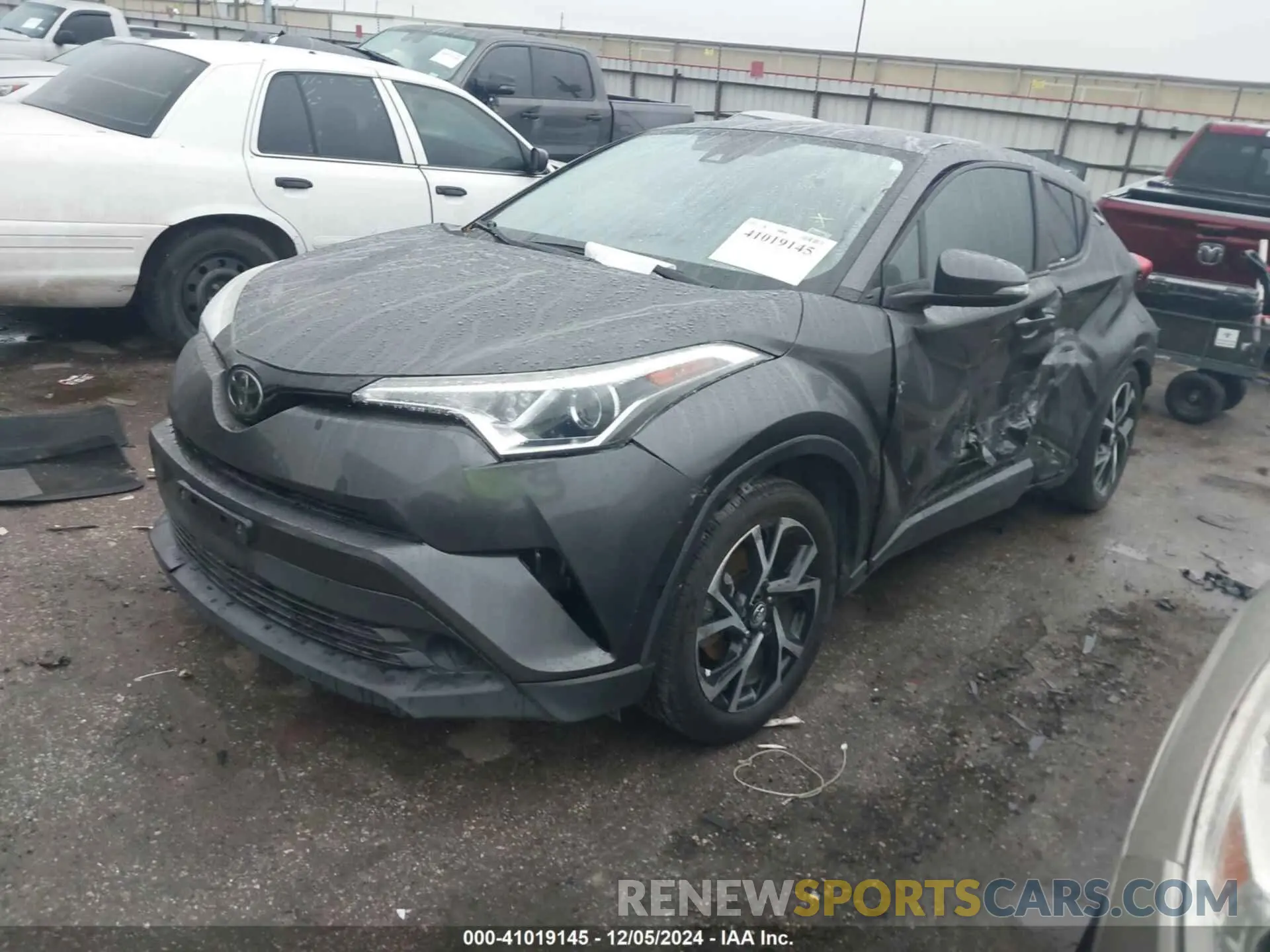 2 fotografías del automóvil dañado NMTKHMBX9KR091450 TOYOTA C-HR 2019