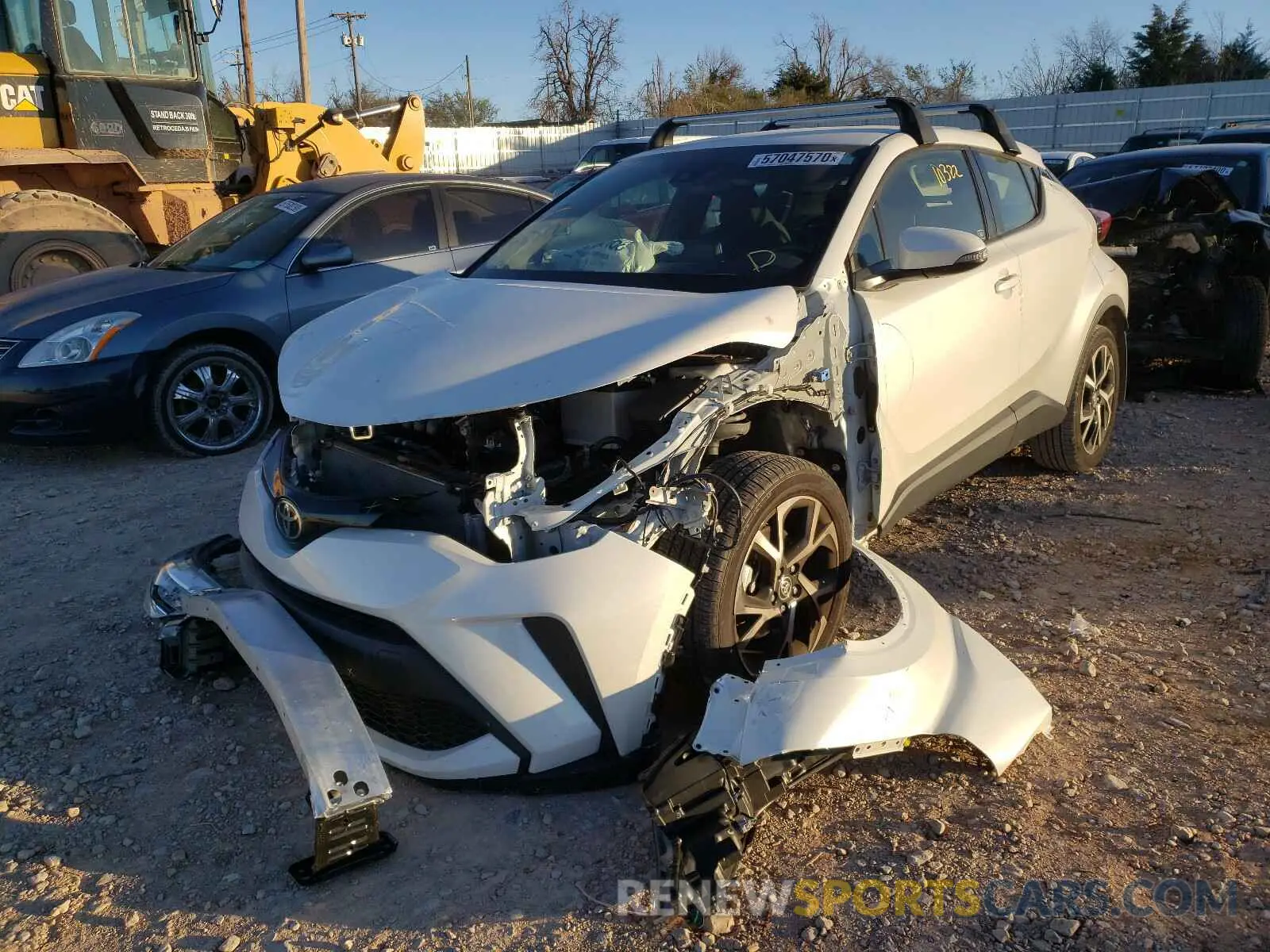 2 fotografías del automóvil dañado JTNKHMBX4L1067407 TOYOTA C-HR 2020