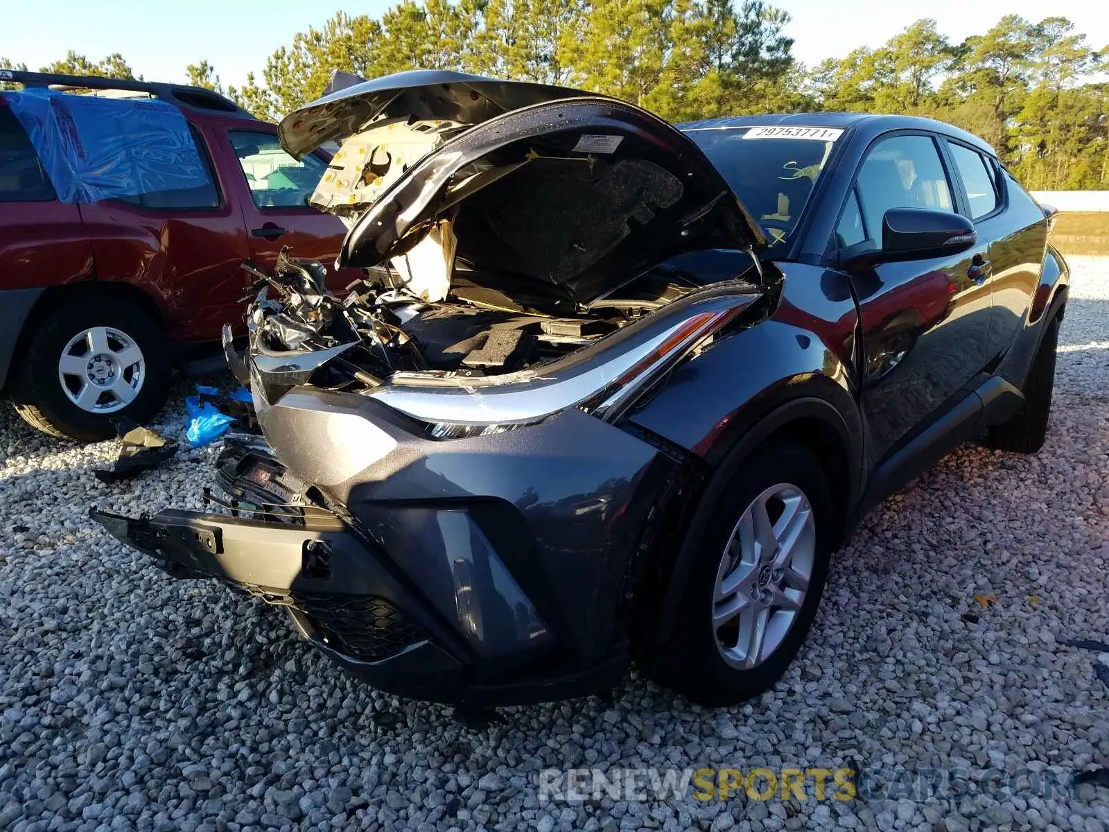 2 fotografías del automóvil dañado JTNKHMBX0M1096470 TOYOTA C-HR 2021