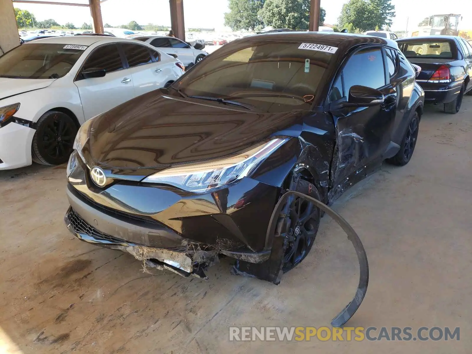 2 fotografías del automóvil dañado JTNKHMBX0M1116667 TOYOTA C-HR 2021