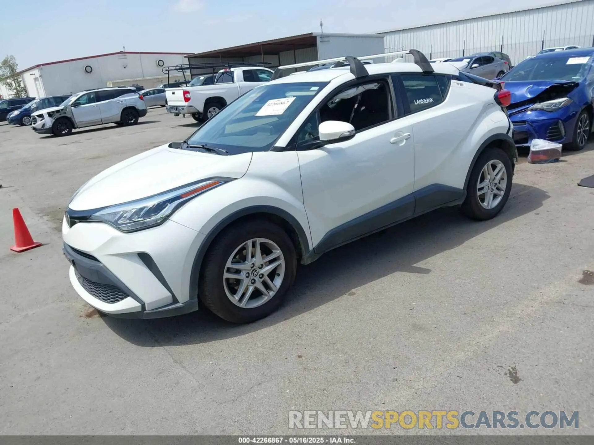 2 fotografías del automóvil dañado JTNKHMBX2M1118467 TOYOTA C-HR 2021