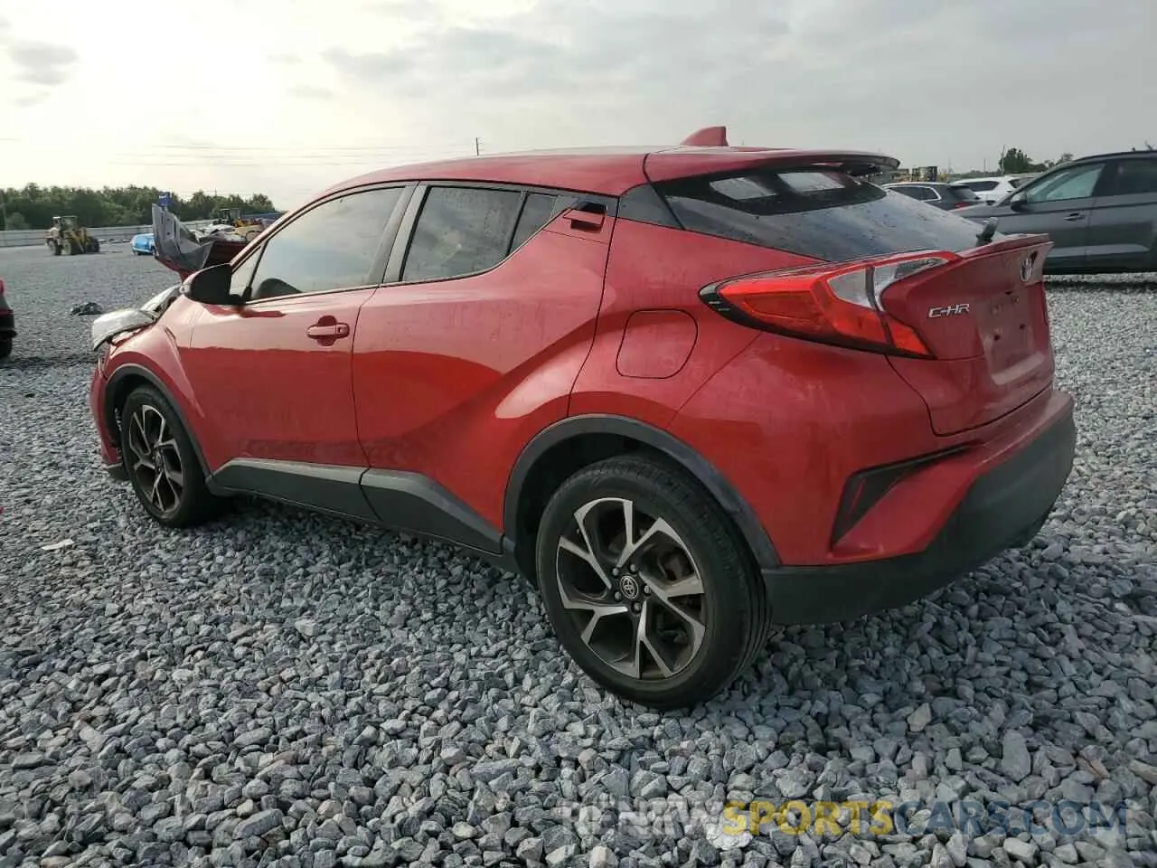2 fotografías del automóvil dañado JTNKHMBX4M1107485 TOYOTA C-HR 2021
