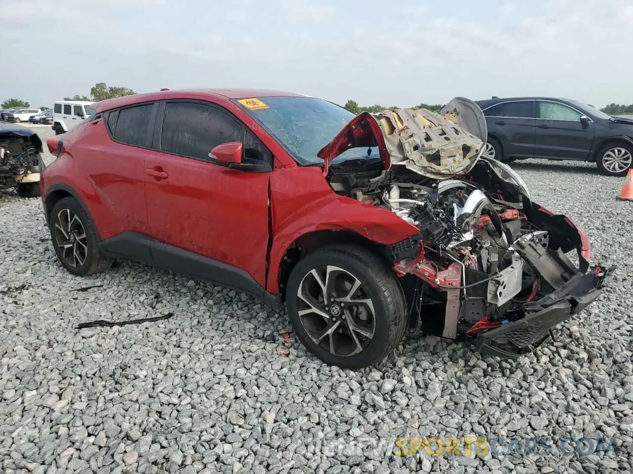 4 fotografías del automóvil dañado JTNKHMBX4M1107485 TOYOTA C-HR 2021