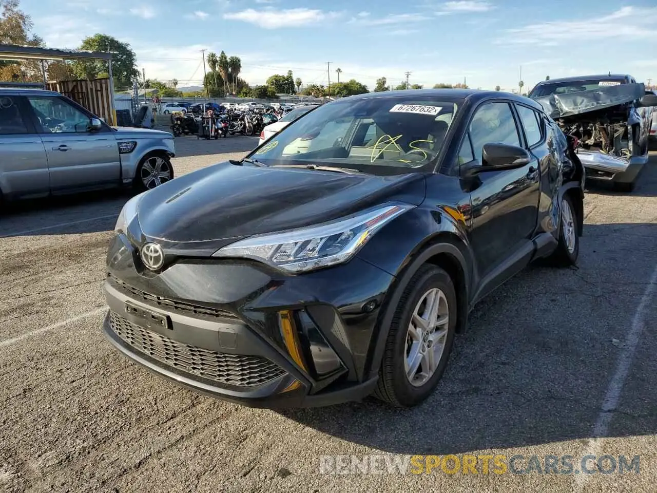 2 fotografías del automóvil dañado JTNKHMBX4M1122889 TOYOTA C-HR 2021