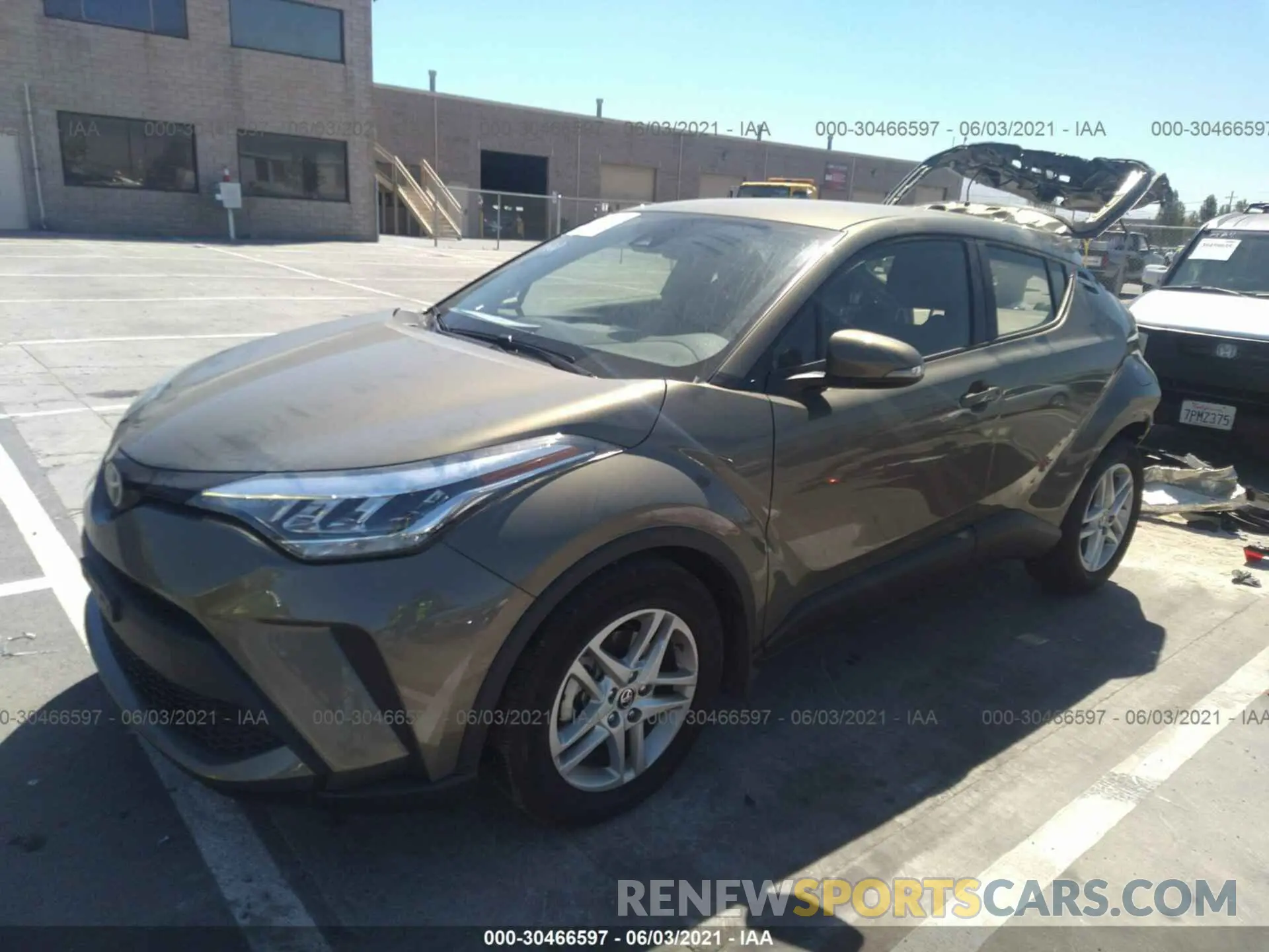 2 fotografías del automóvil dañado JTNKHMBX9M1110222 TOYOTA C-HR 2021