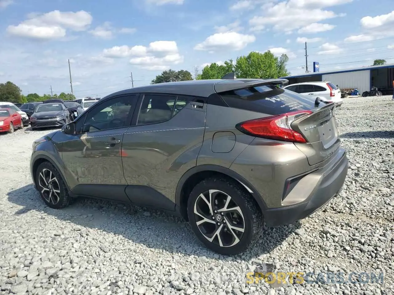 2 fotografías del automóvil dañado JTNKHMBXXM1099473 TOYOTA C-HR 2021