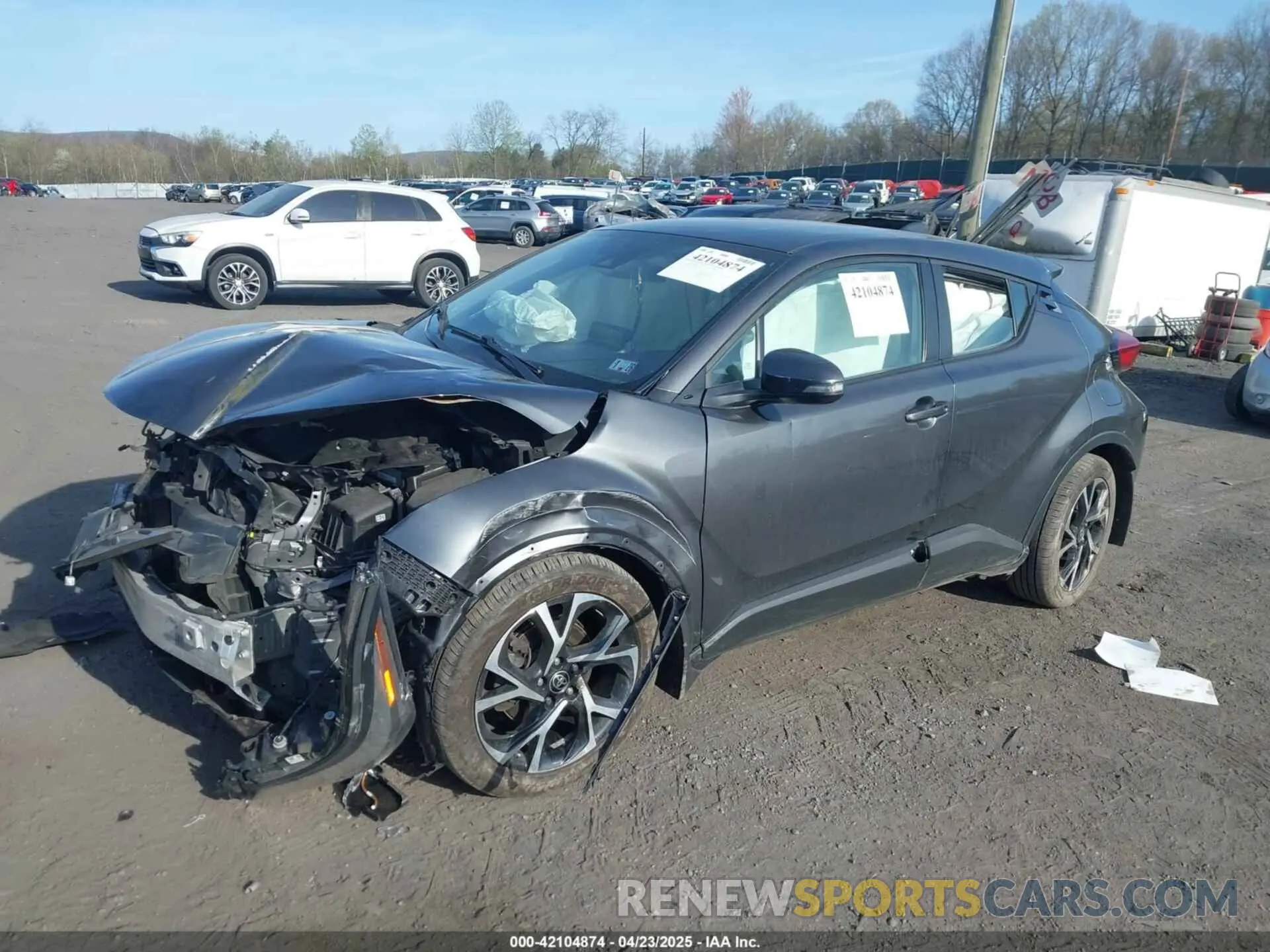2 fotografías del automóvil dañado NMTKHMBXXNR145682 TOYOTA C-HR 2022