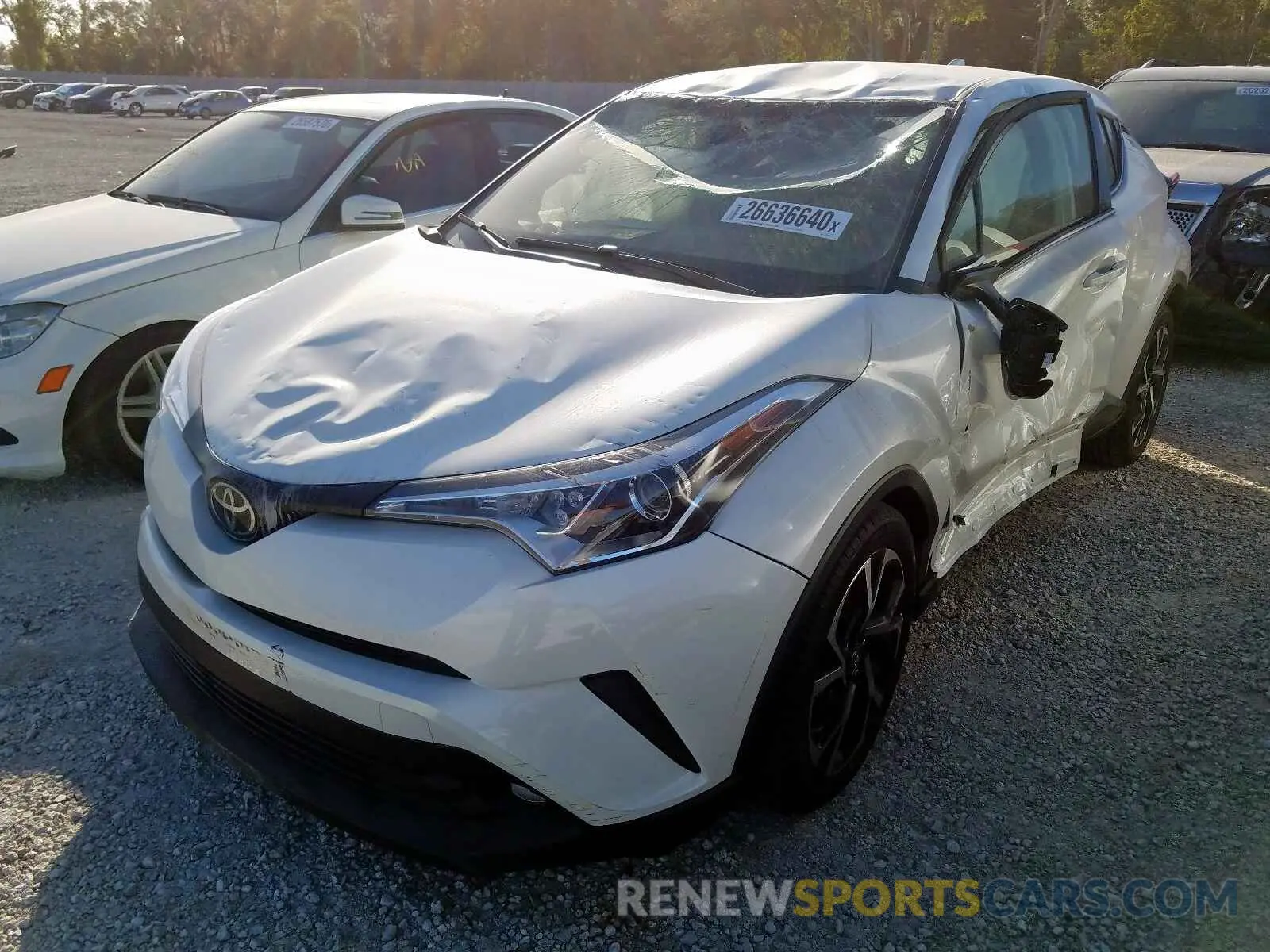 2 fotografías del automóvil dañado JTNKHMBX6K1051241 TOYOTA C-HR XLE 2019