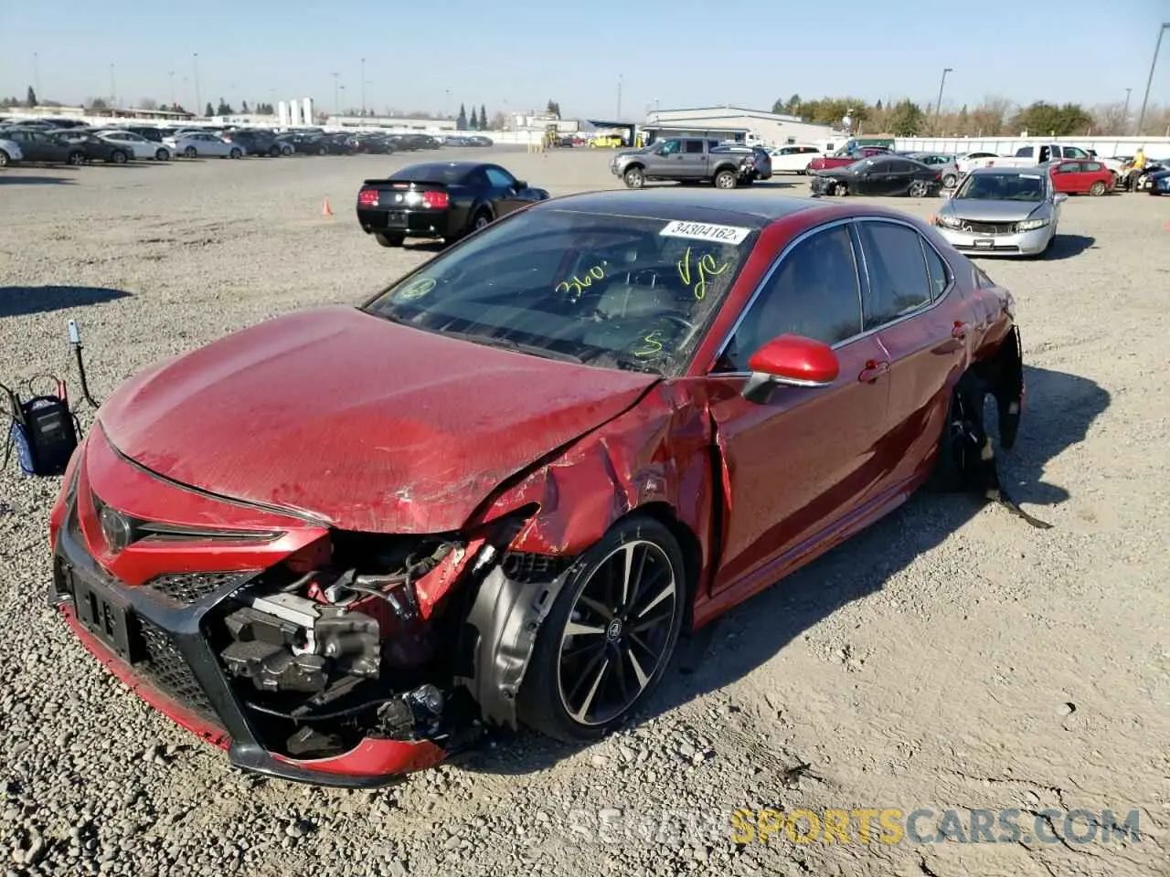 2 fotografías del automóvil dañado 4T1BZ1HKXKU026297 TOYOTA CAMRY 2019
