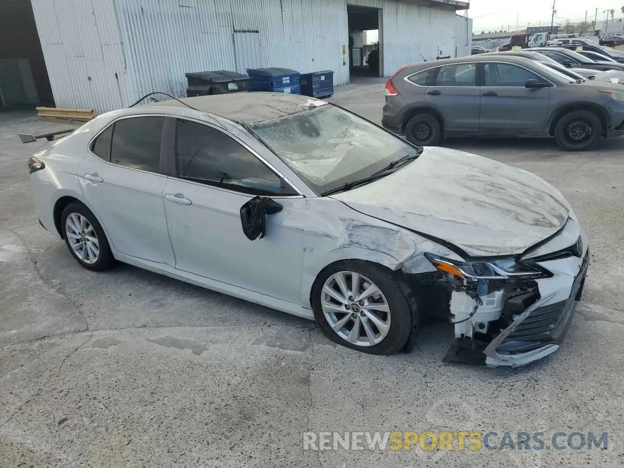 4 fotografías del automóvil dañado 4T1C11AK4NU067759 TOYOTA CAMRY 2022