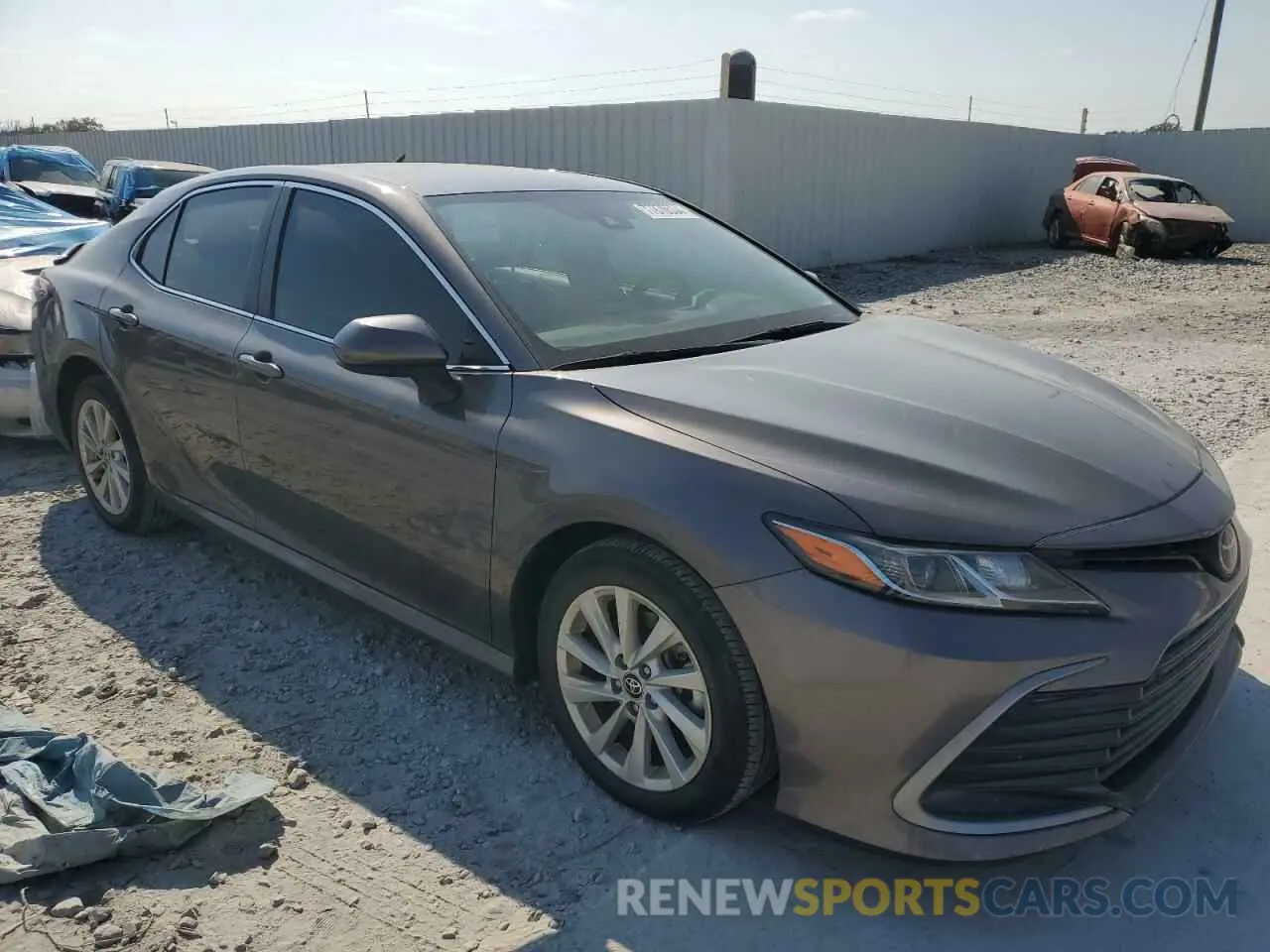 4 fotografías del automóvil dañado 4T1C11AK9NU717024 TOYOTA CAMRY 2022