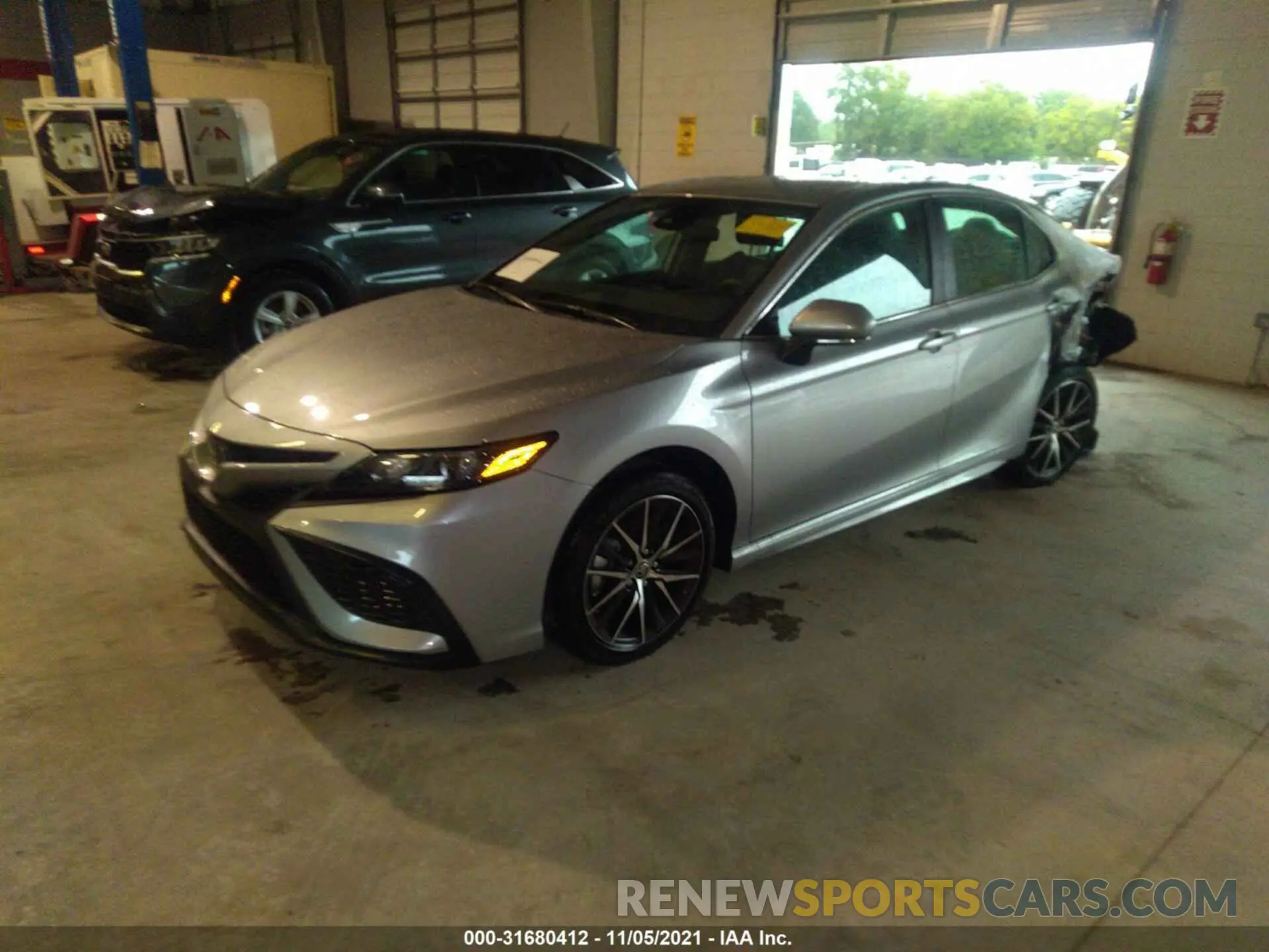 2 fotografías del automóvil dañado 4T1G11AK1NU624810 TOYOTA CAMRY 2022