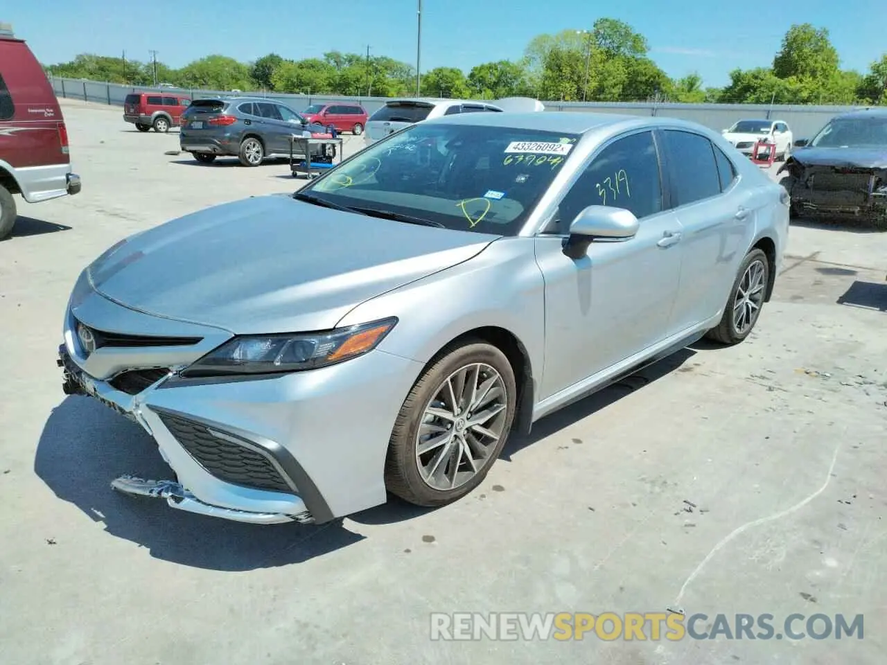 2 fotografías del automóvil dañado 4T1G11AK6NU639044 TOYOTA CAMRY 2022
