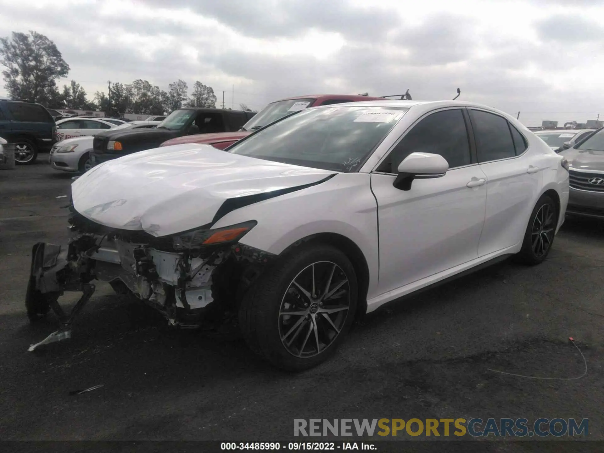 2 fotografías del automóvil dañado 4T1G11AKXNU657353 TOYOTA CAMRY 2022