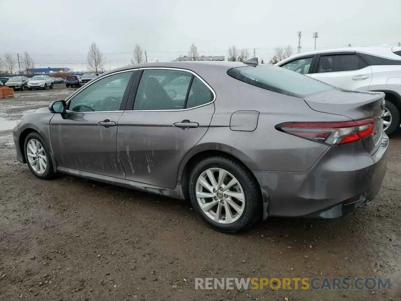 2 fotografías del automóvil dañado 4T1H11AK7NU056082 TOYOTA CAMRY 2022