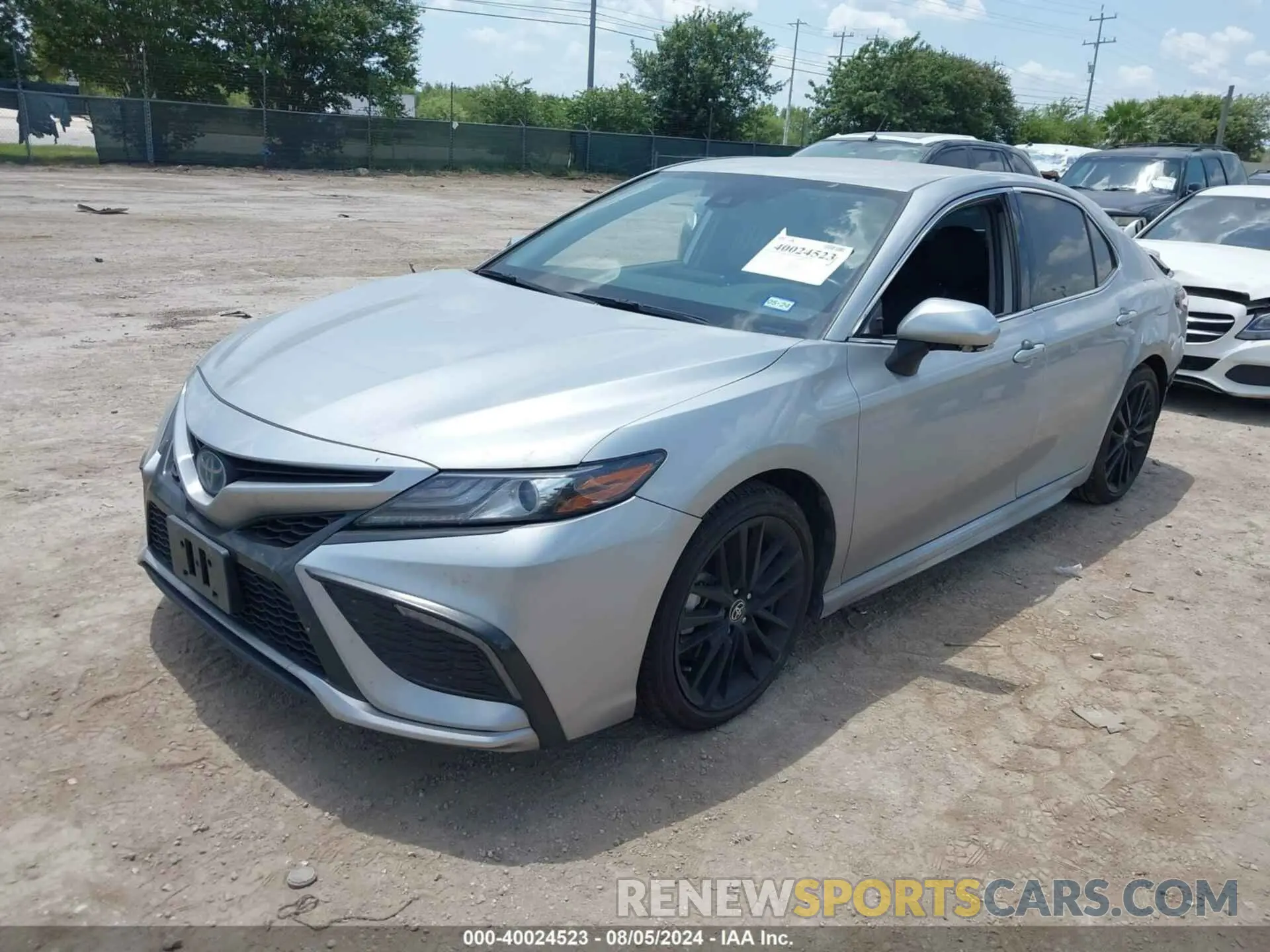 2 fotografías del automóvil dañado 4T1K31AK9NU041650 TOYOTA CAMRY 2022