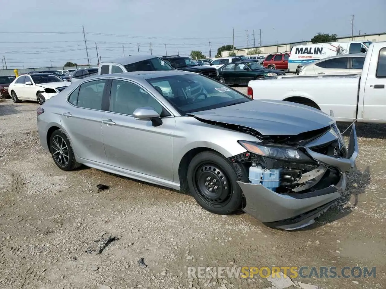 4 fotografías del automóvil dañado 4T1T11BK4NU068344 TOYOTA CAMRY 2022