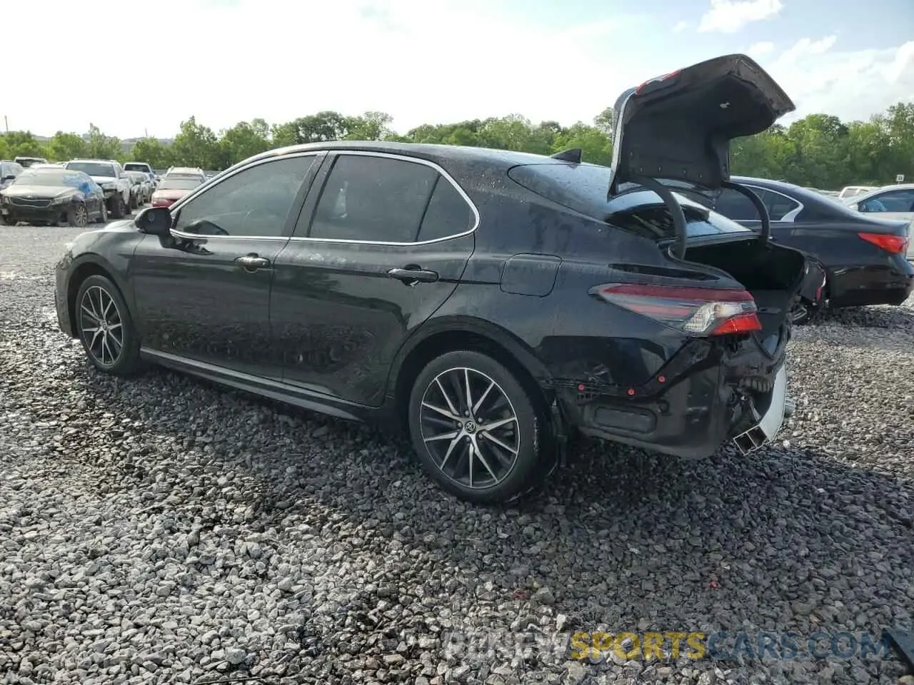 2 fotografías del automóvil dañado 4T1G11AK3PU768314 TOYOTA CAMRY 2023