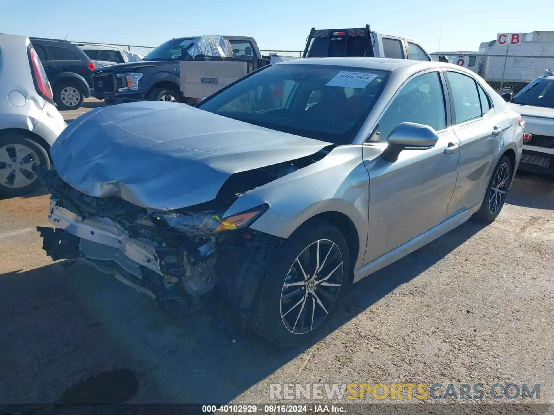 2 fotografías del automóvil dañado 4T1T11AK0PU831299 TOYOTA CAMRY 2023