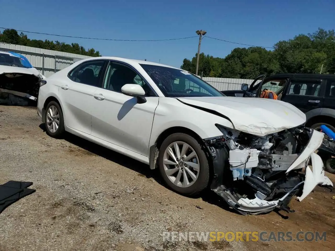 4 fotografías del automóvil dañado 4T1C11AK4RU248625 TOYOTA CAMRY 2024