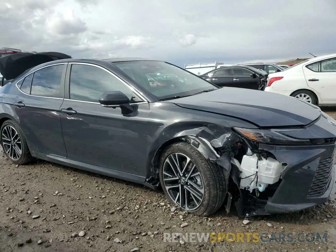 4 fotografías del automóvil dañado 4T1DBADK5SU019065 TOYOTA CAMRY 2025