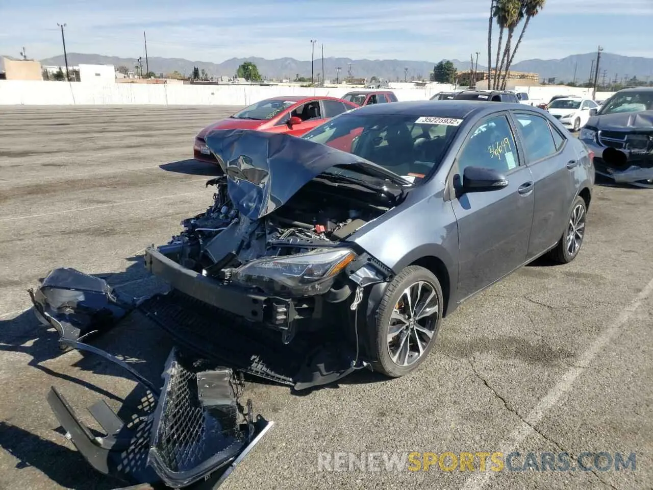 2 fotografías del automóvil dañado 2T1BURHE3KC162375 TOYOTA COROLLA 2019