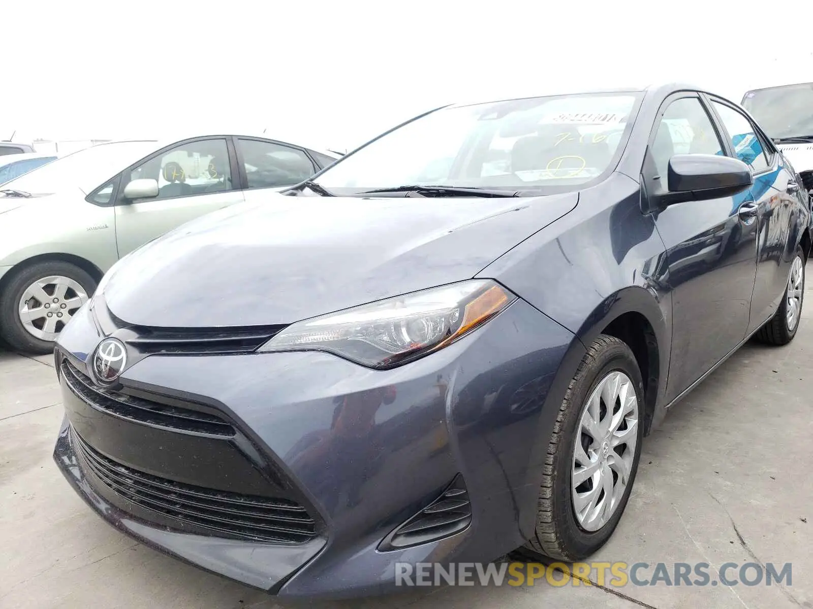 2 fotografías del automóvil dañado 5YFBURHE3KP934339 TOYOTA COROLLA 2019