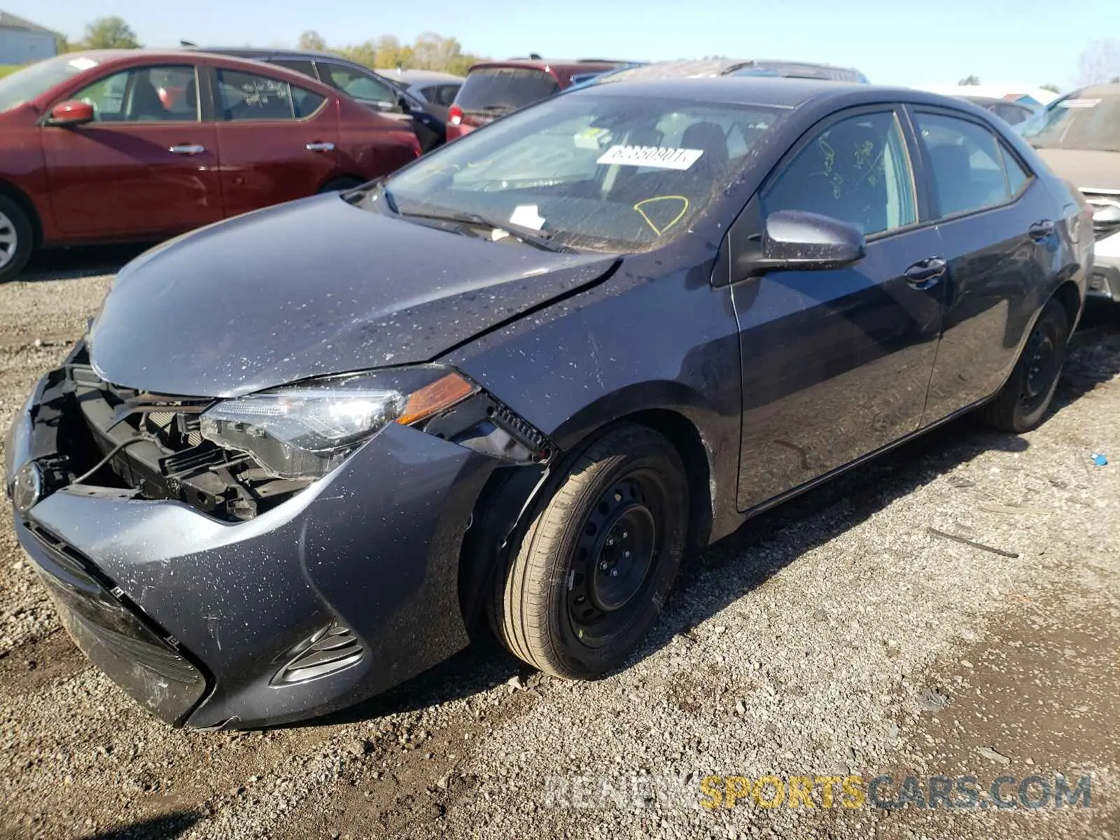 2 fotografías del automóvil dañado 5YFBURHE4KP941395 TOYOTA COROLLA 2019