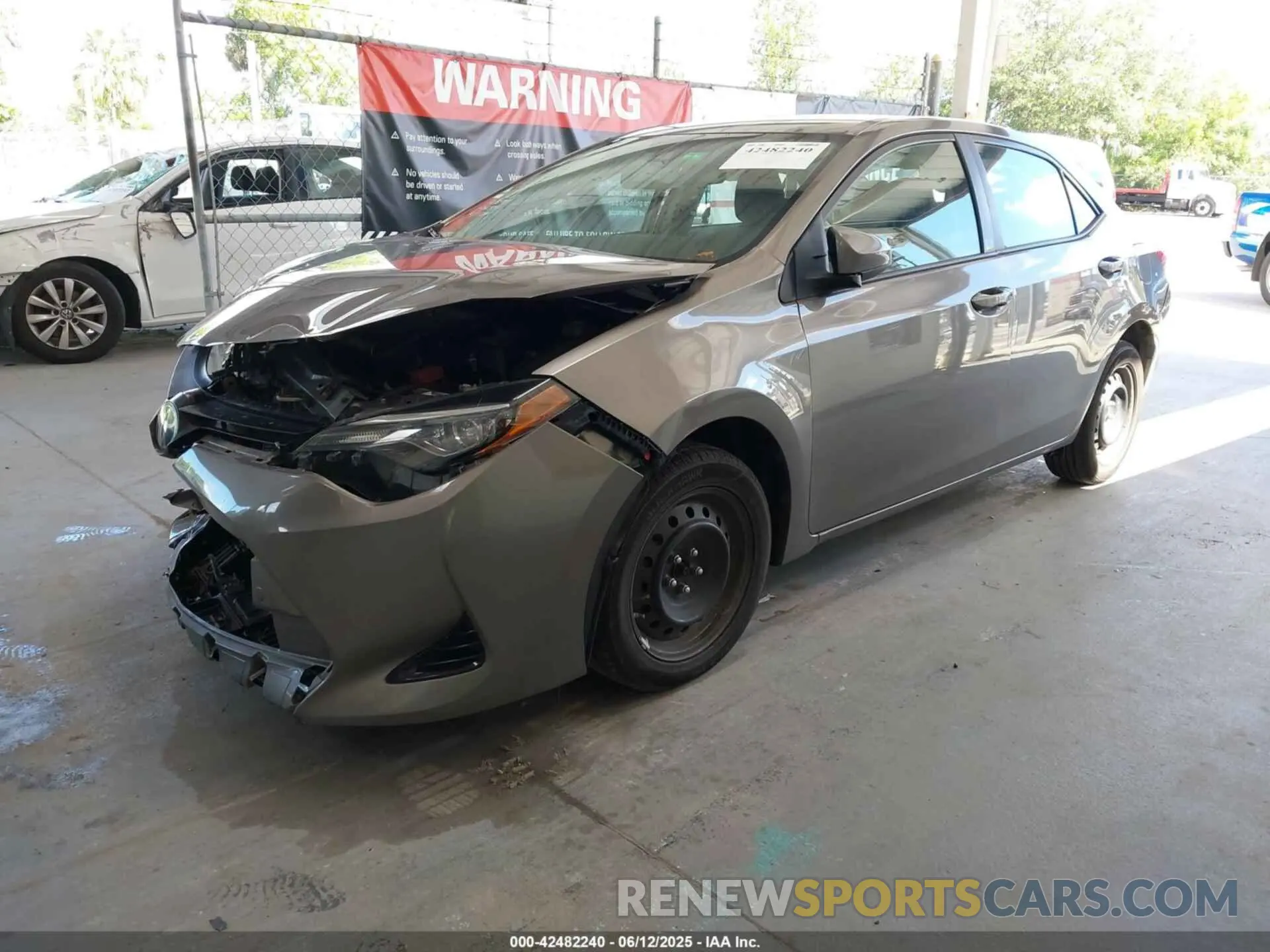 2 fotografías del automóvil dañado 5YFBURHE5KP858493 TOYOTA COROLLA 2019