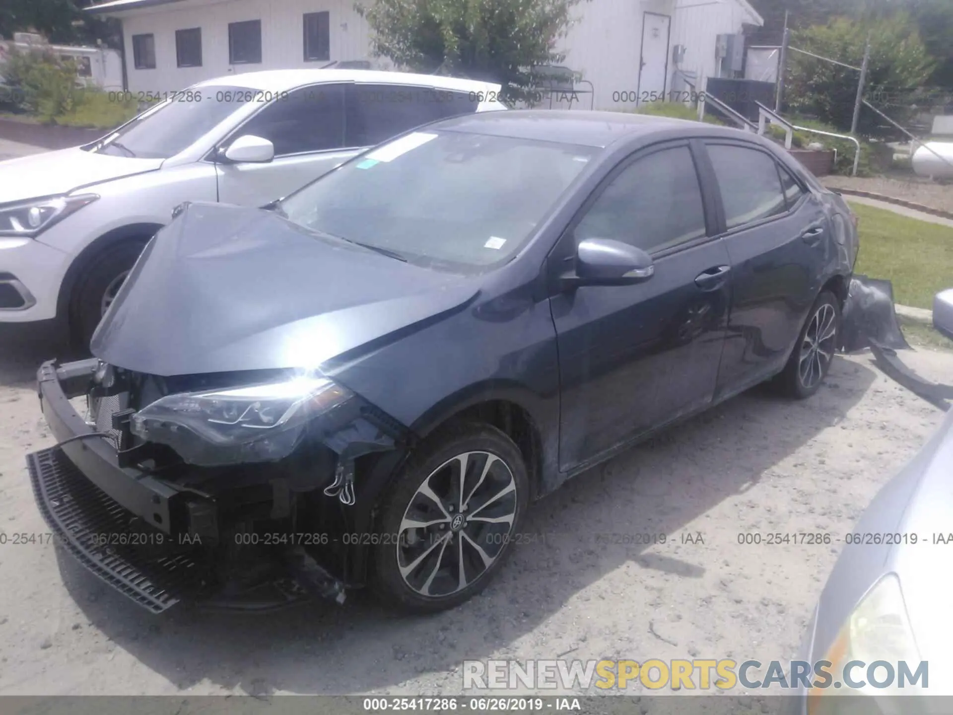 2 fotografías del automóvil dañado 5YFBURHE5KP875469 TOYOTA COROLLA 2019