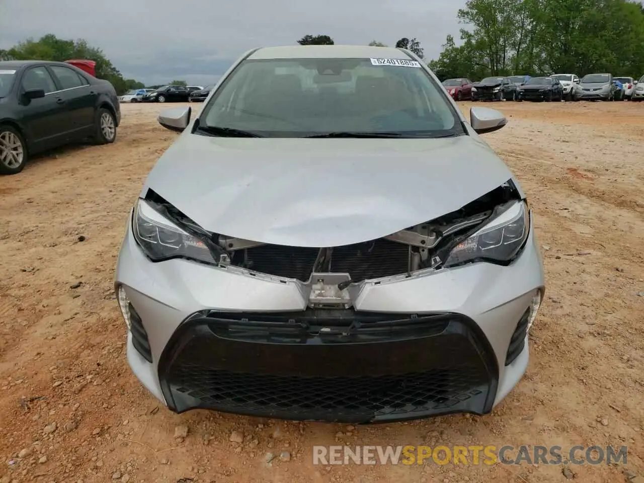 5 fotografías del automóvil dañado 5YFBURHE5KP910088 TOYOTA COROLLA 2019