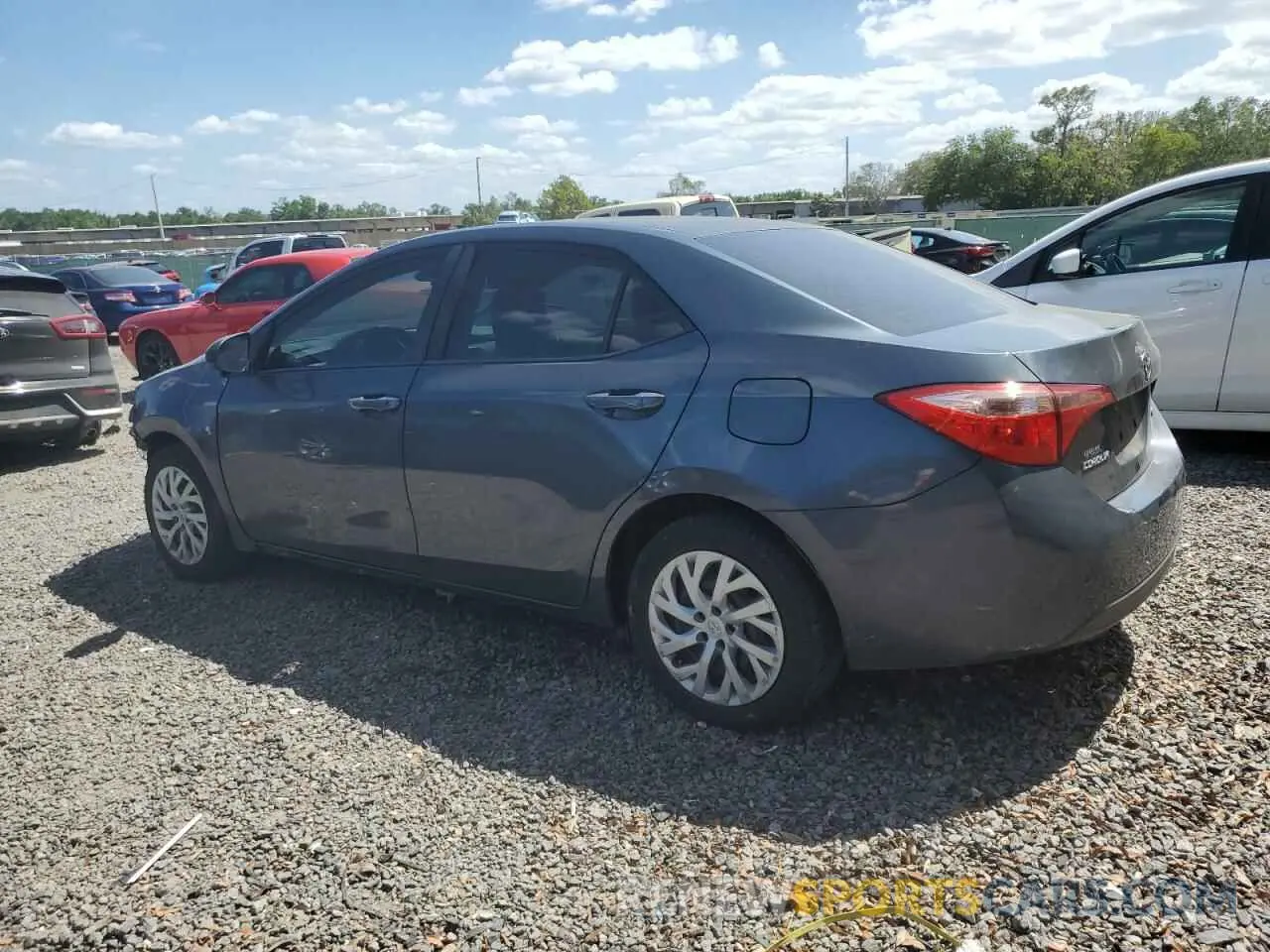 2 fotografías del automóvil dañado 5YFBURHE5KP912486 TOYOTA COROLLA 2019