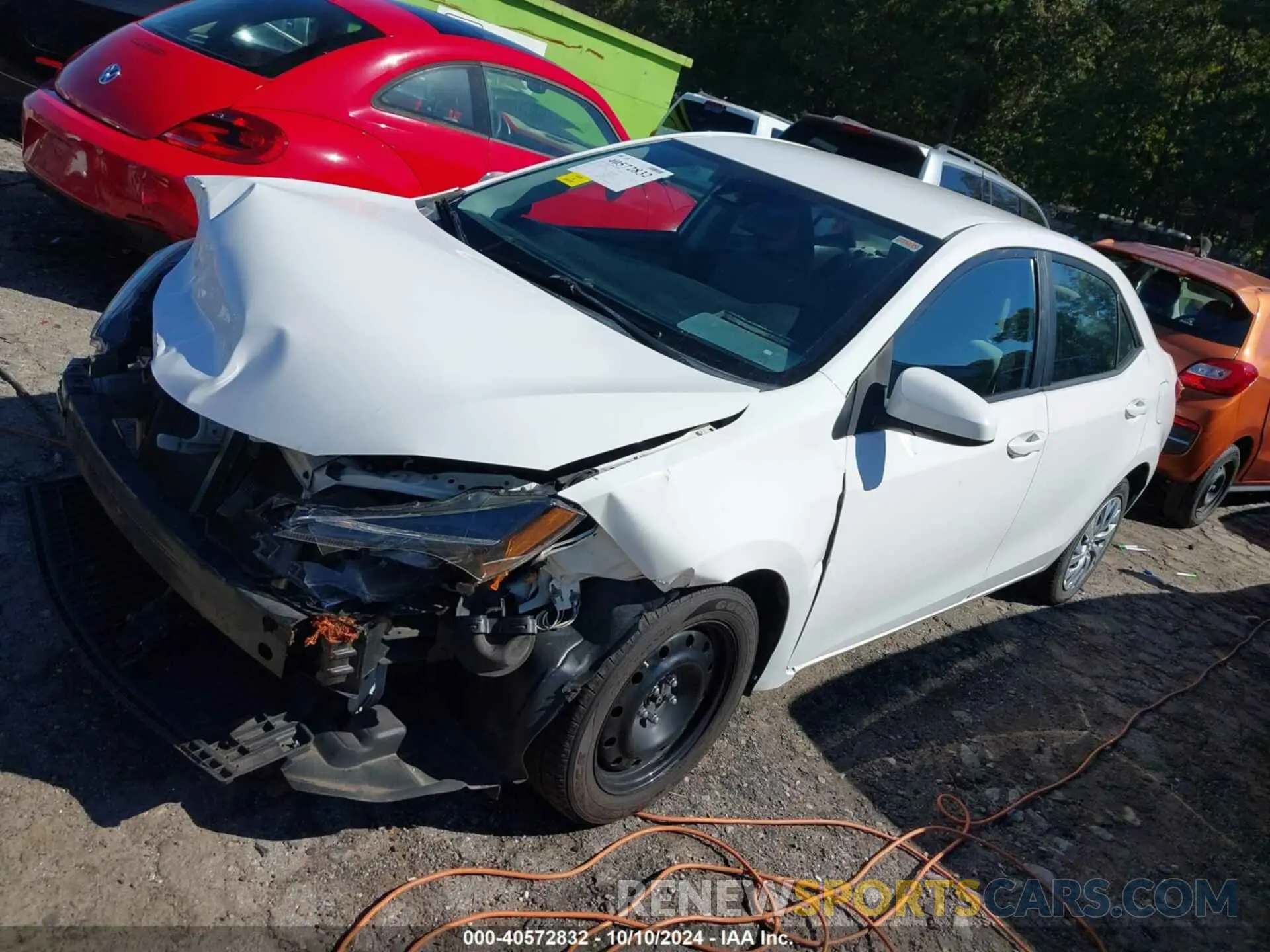 2 fotografías del automóvil dañado 5YFBURHE6KP871690 TOYOTA COROLLA 2019