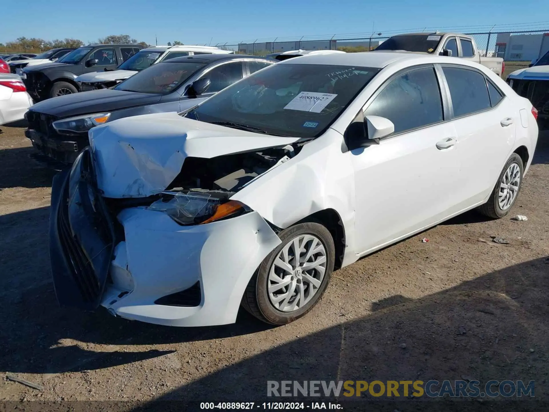 2 fotografías del automóvil dañado 5YFBURHE7KP875277 TOYOTA COROLLA 2019