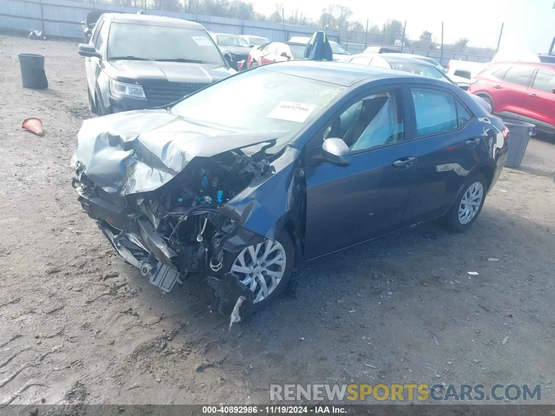 2 fotografías del automóvil dañado 5YFBURHE8KP877975 TOYOTA COROLLA 2019