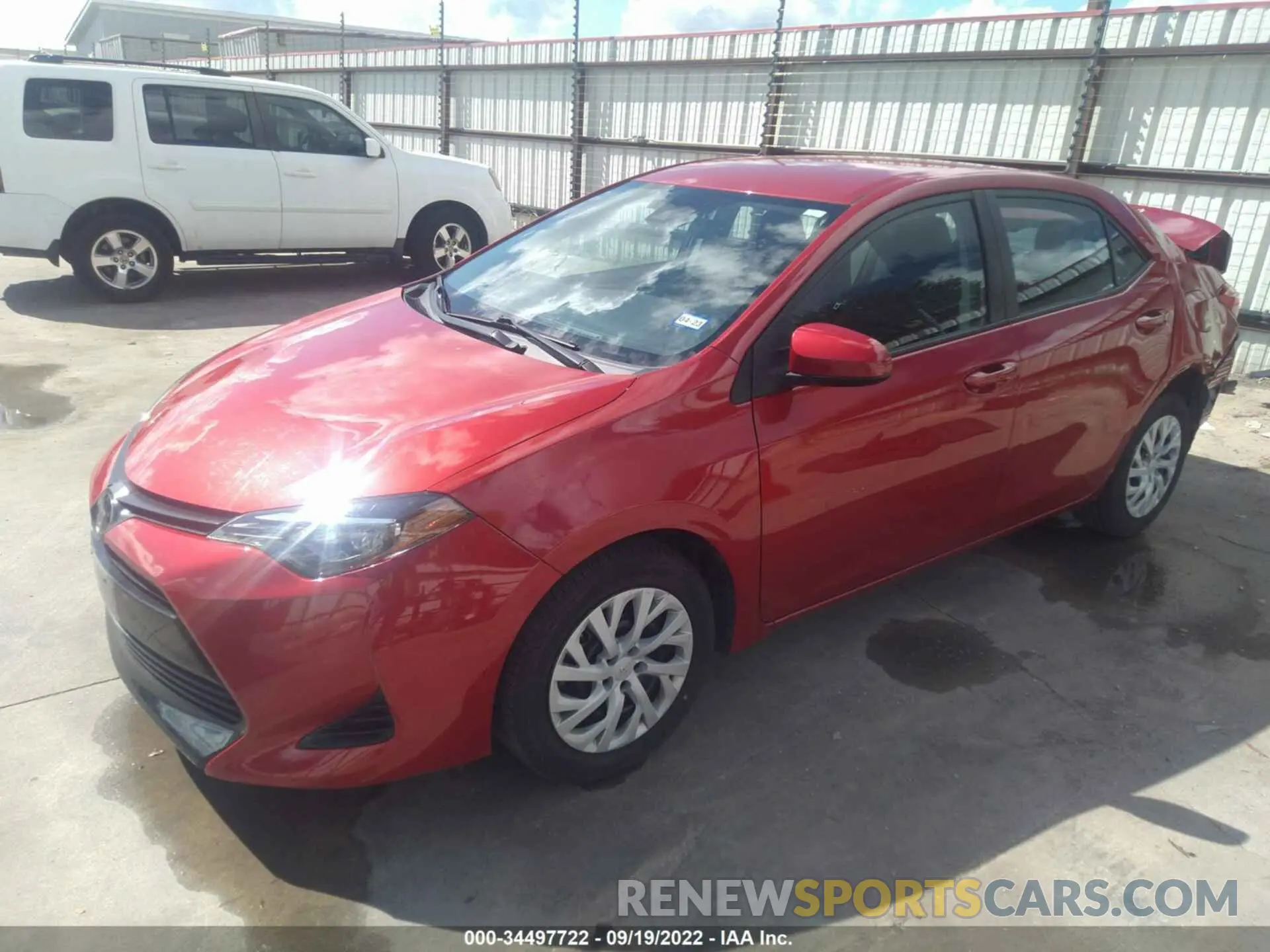 2 fotografías del automóvil dañado 5YFBURHE9KP879654 TOYOTA COROLLA 2019