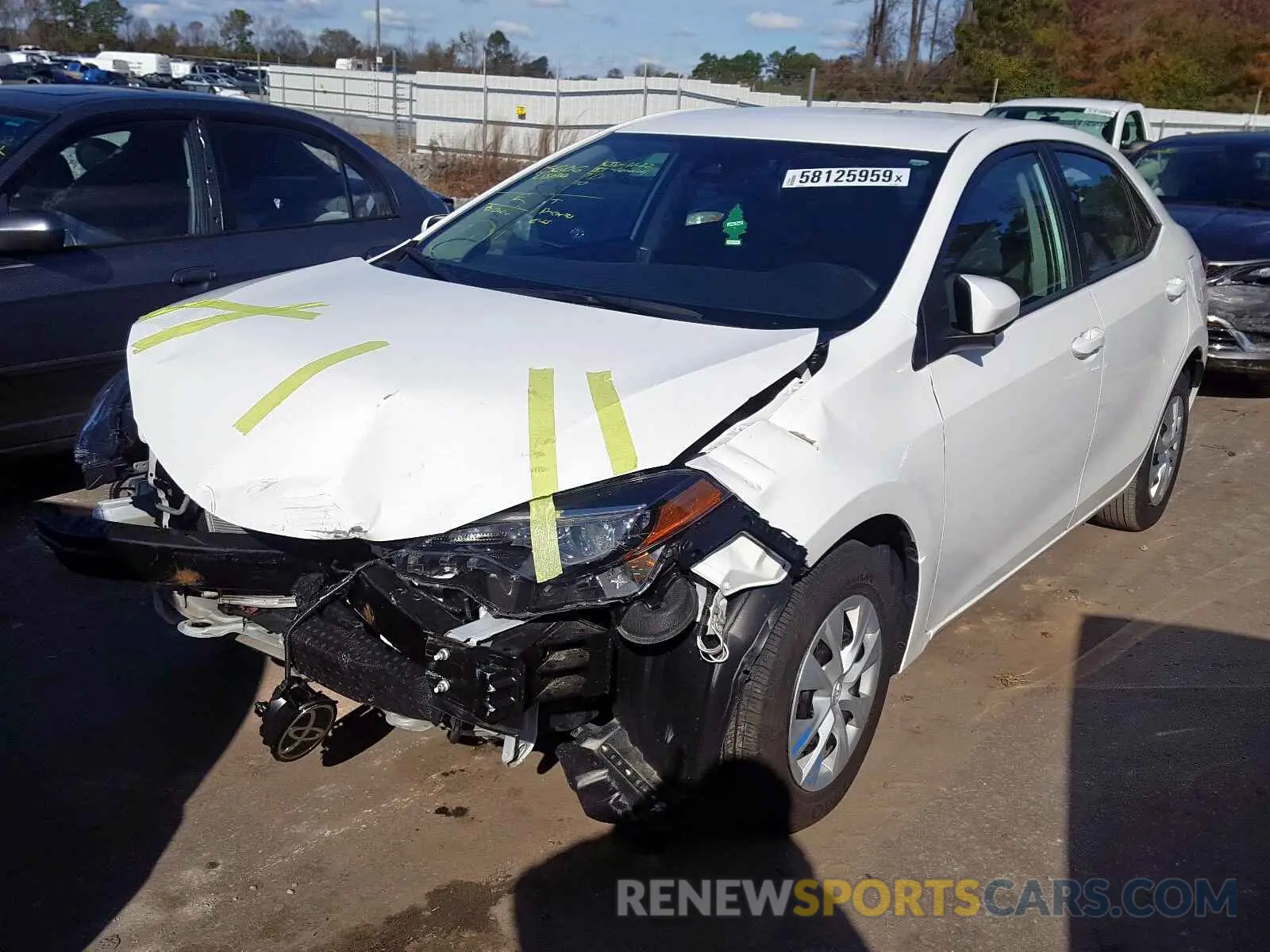2 fotografías del automóvil dañado 5YFBURHE9KP882392 TOYOTA COROLLA 2019