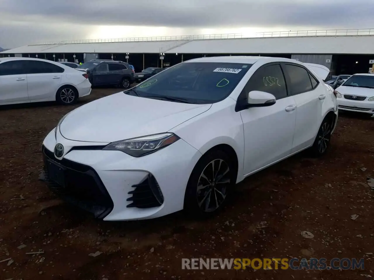 2 fotografías del automóvil dañado 5YFBURHE9KP909574 TOYOTA COROLLA 2019
