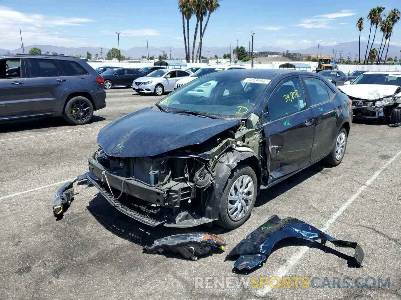 2 fotografías del automóvil dañado 5YFBURHEXKP925704 TOYOTA COROLLA 2019