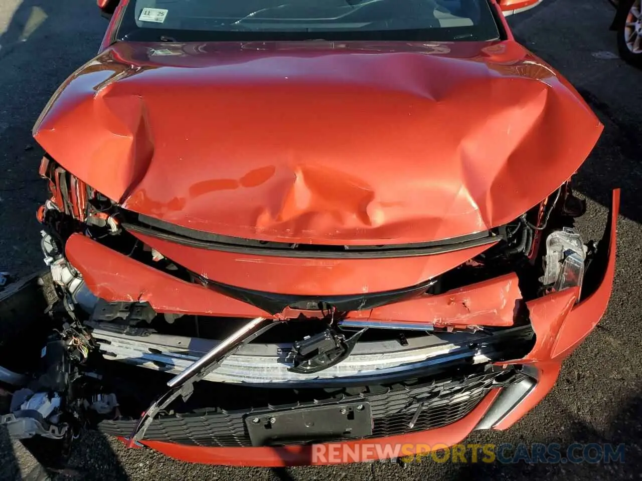 11 fotografías del automóvil dañado JTNK4RBE3K3003885 TOYOTA COROLLA 2019