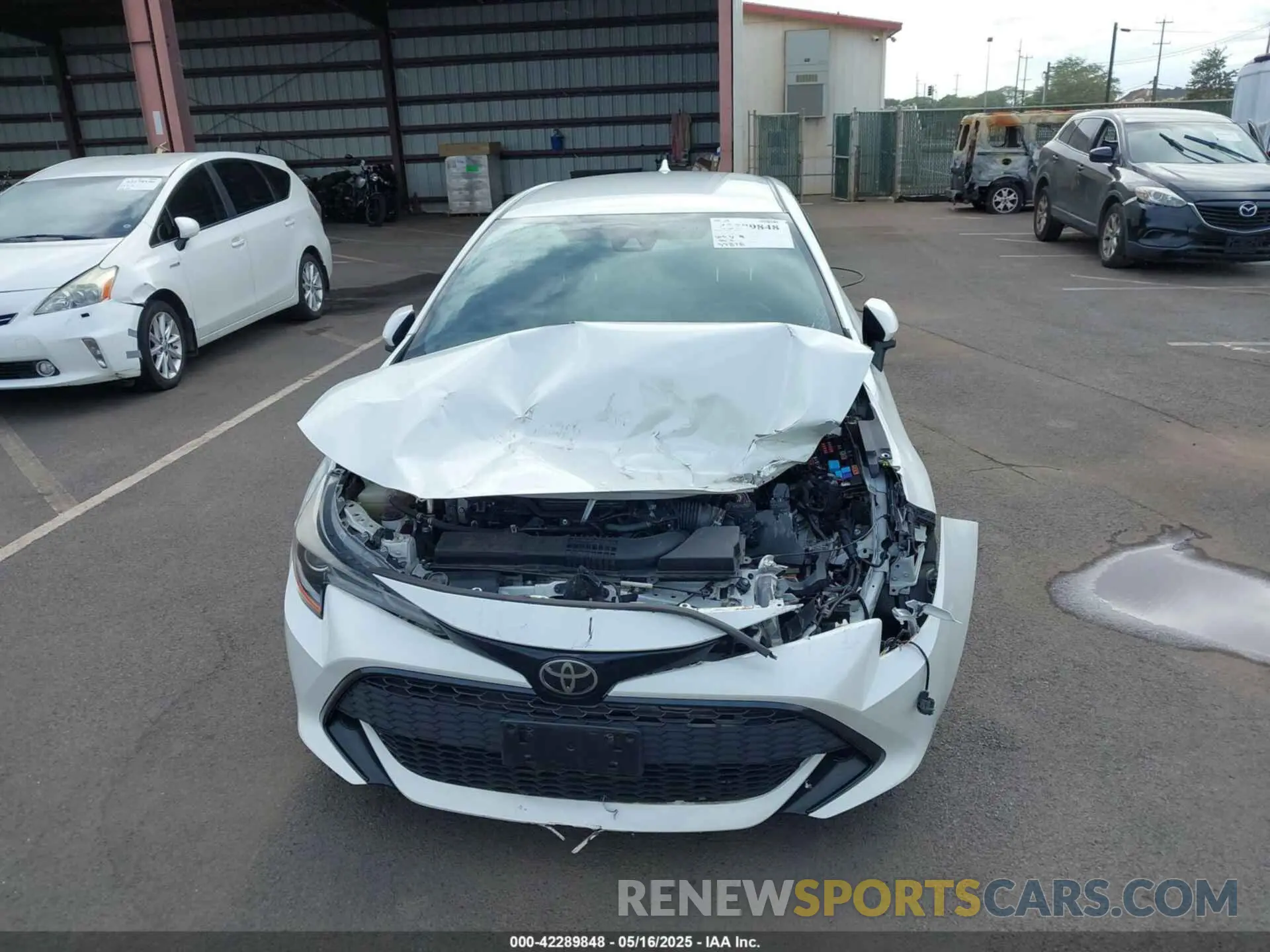 12 fotografías del automóvil dañado JTNK4RBE7K3056072 TOYOTA COROLLA 2019