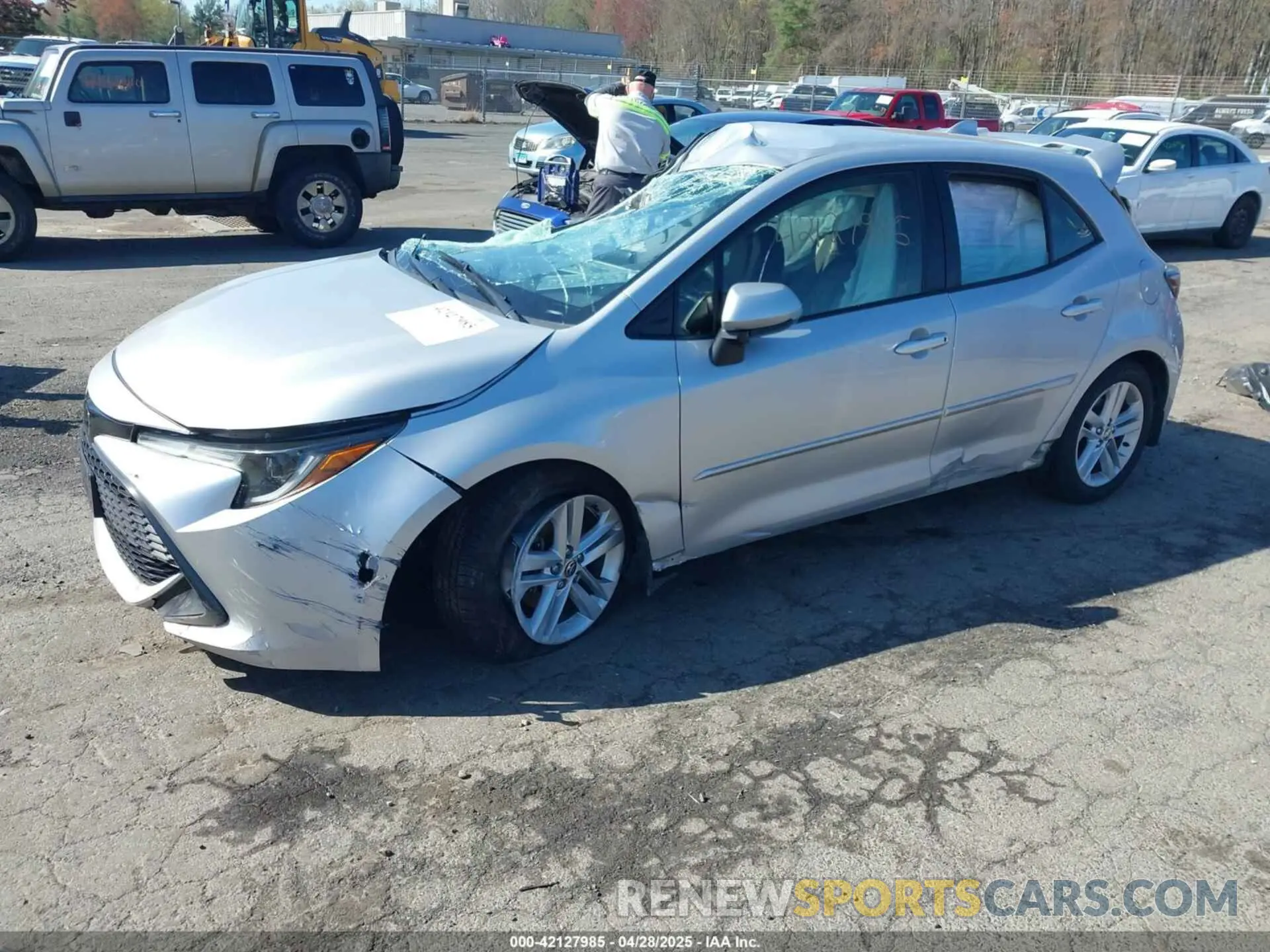 2 fotografías del automóvil dañado JTNK4RBE9K3037779 TOYOTA COROLLA 2019