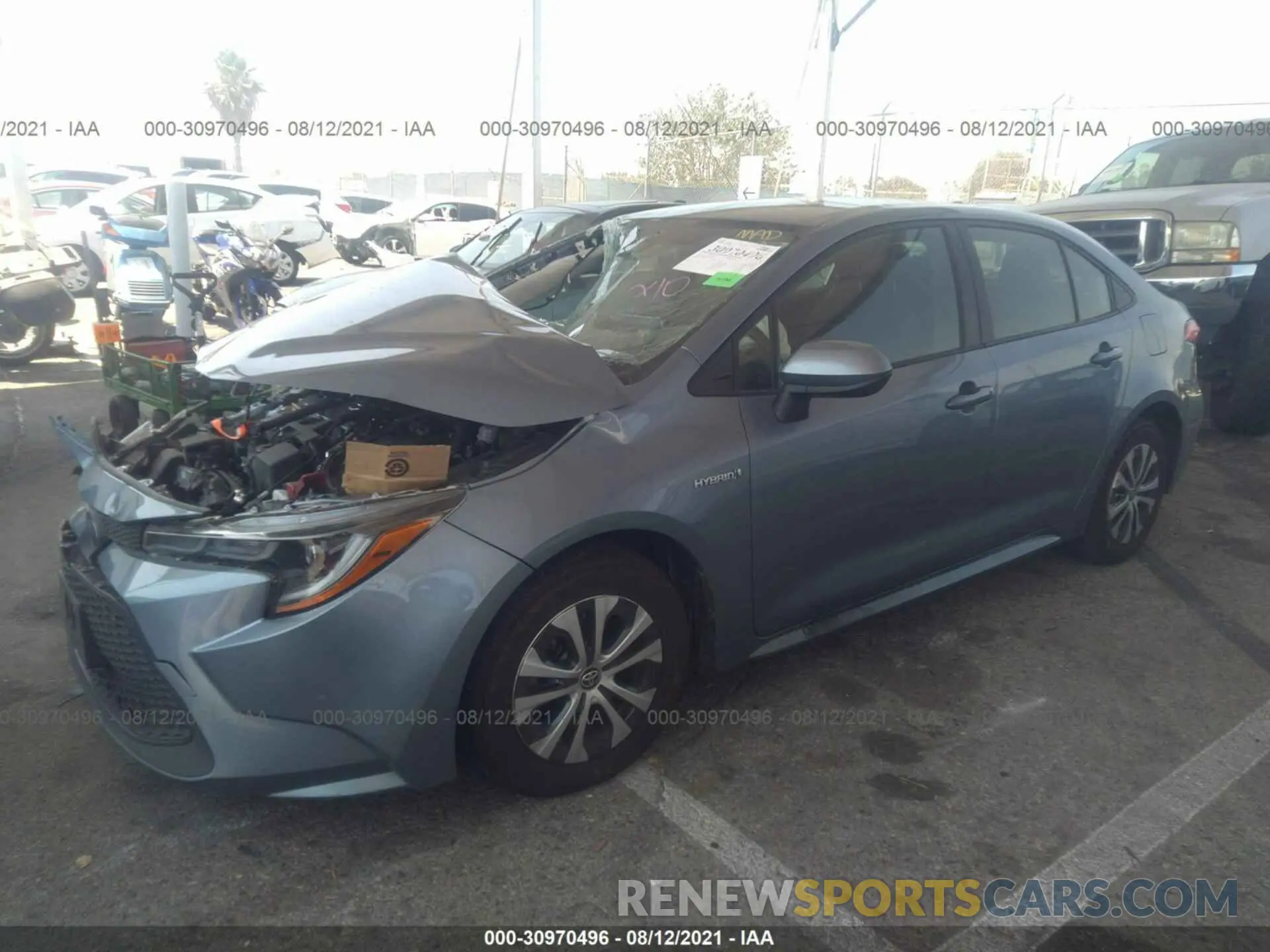 2 fotografías del automóvil dañado JTDEBRBE9LJ029797 TOYOTA COROLLA 2020