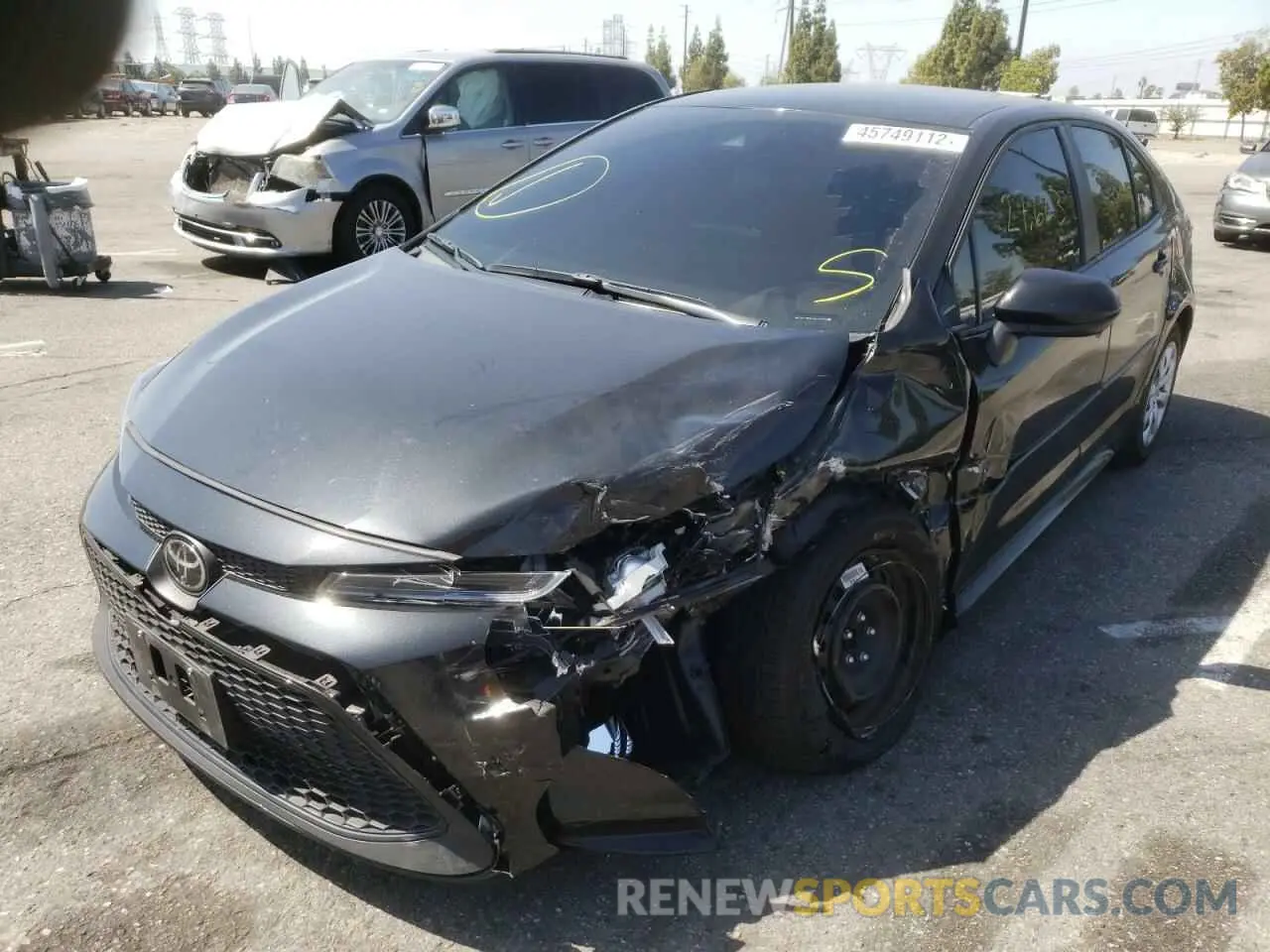 2 fotografías del automóvil dañado 5YFEPMAE5MP213296 TOYOTA COROLLA 2021