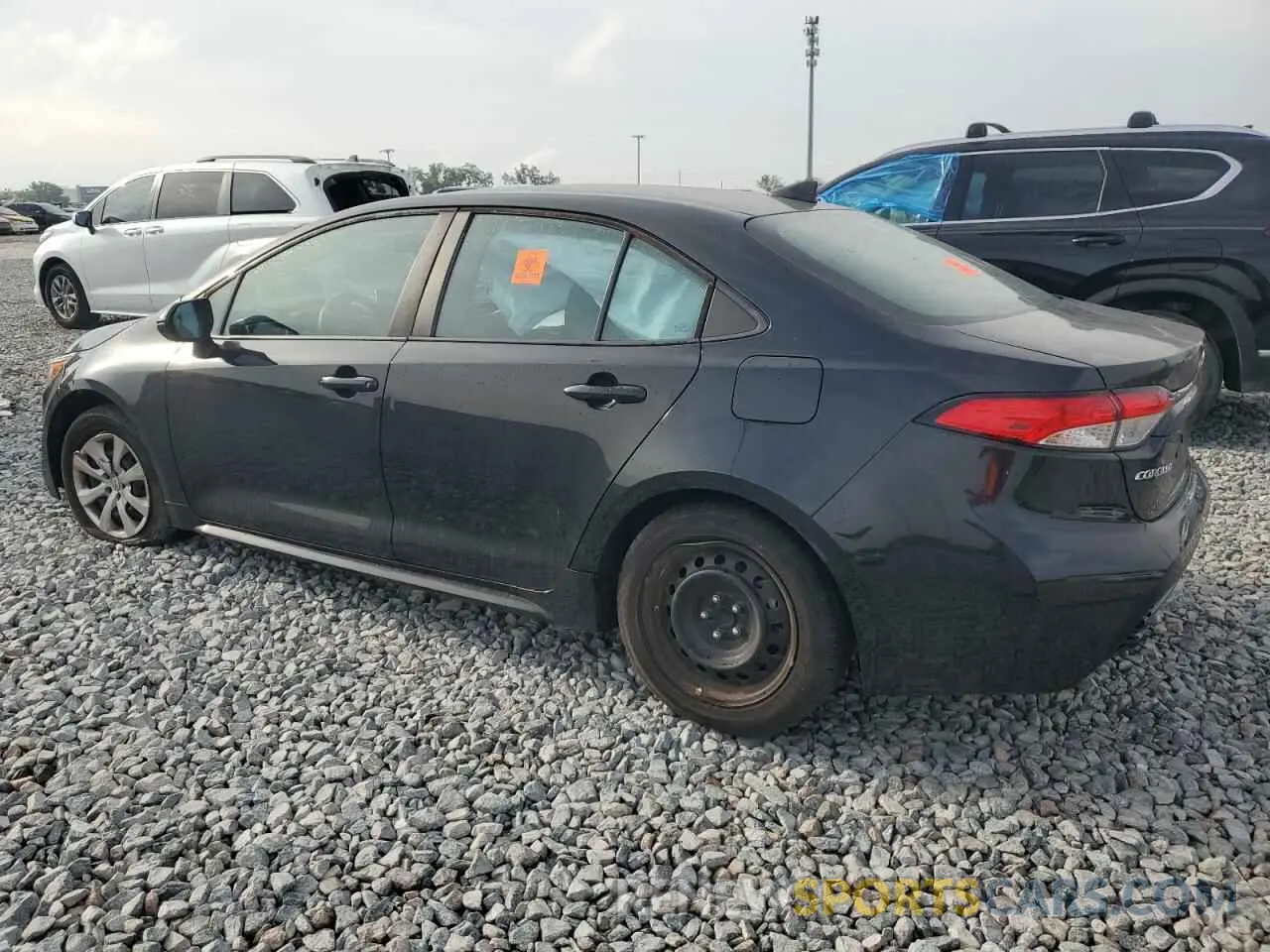 2 fotografías del automóvil dañado 5YFEPMAEXMP260775 TOYOTA COROLLA 2021