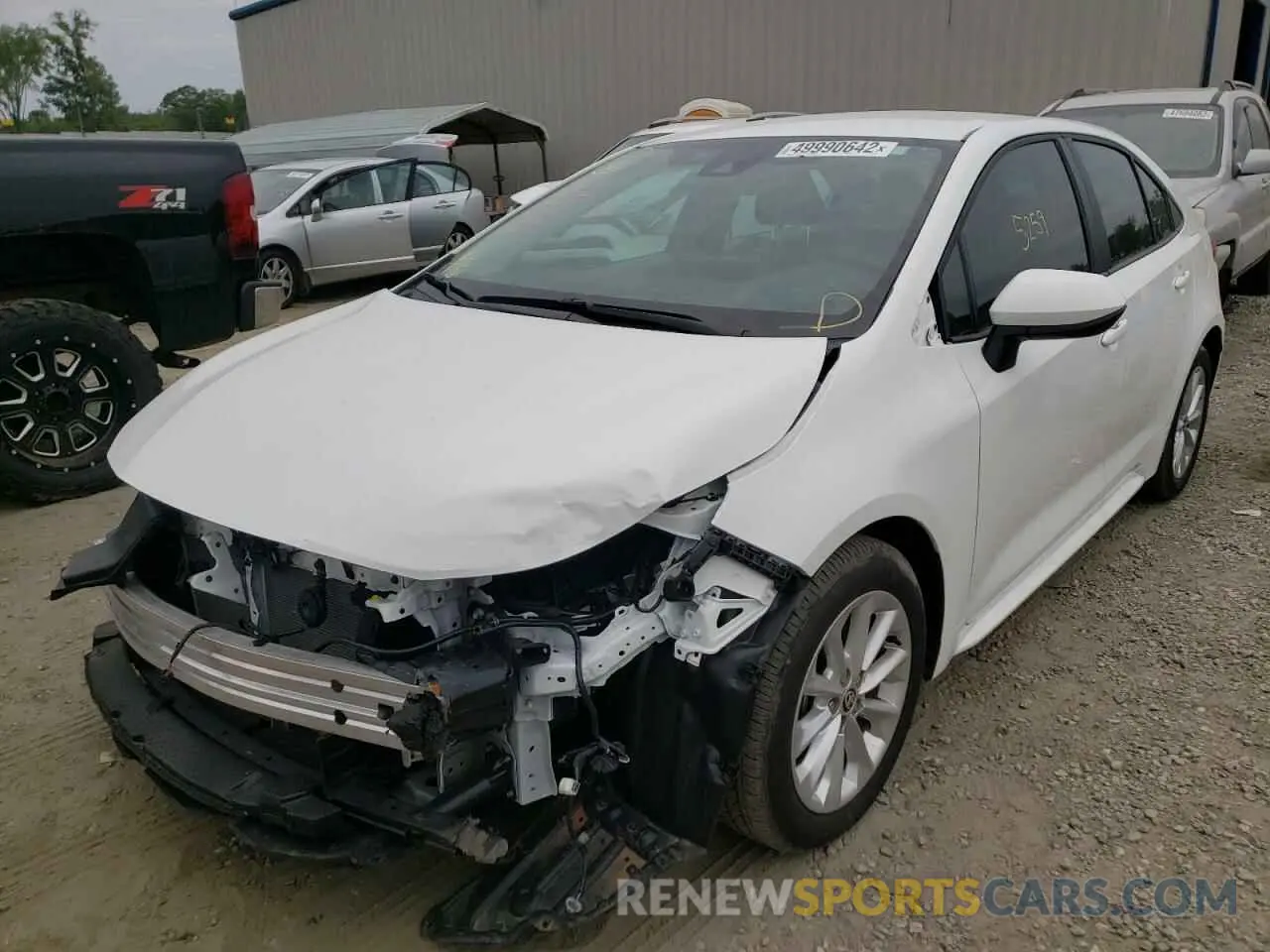 2 fotografías del automóvil dañado 5YFVPMAE2MP256560 TOYOTA COROLLA 2021