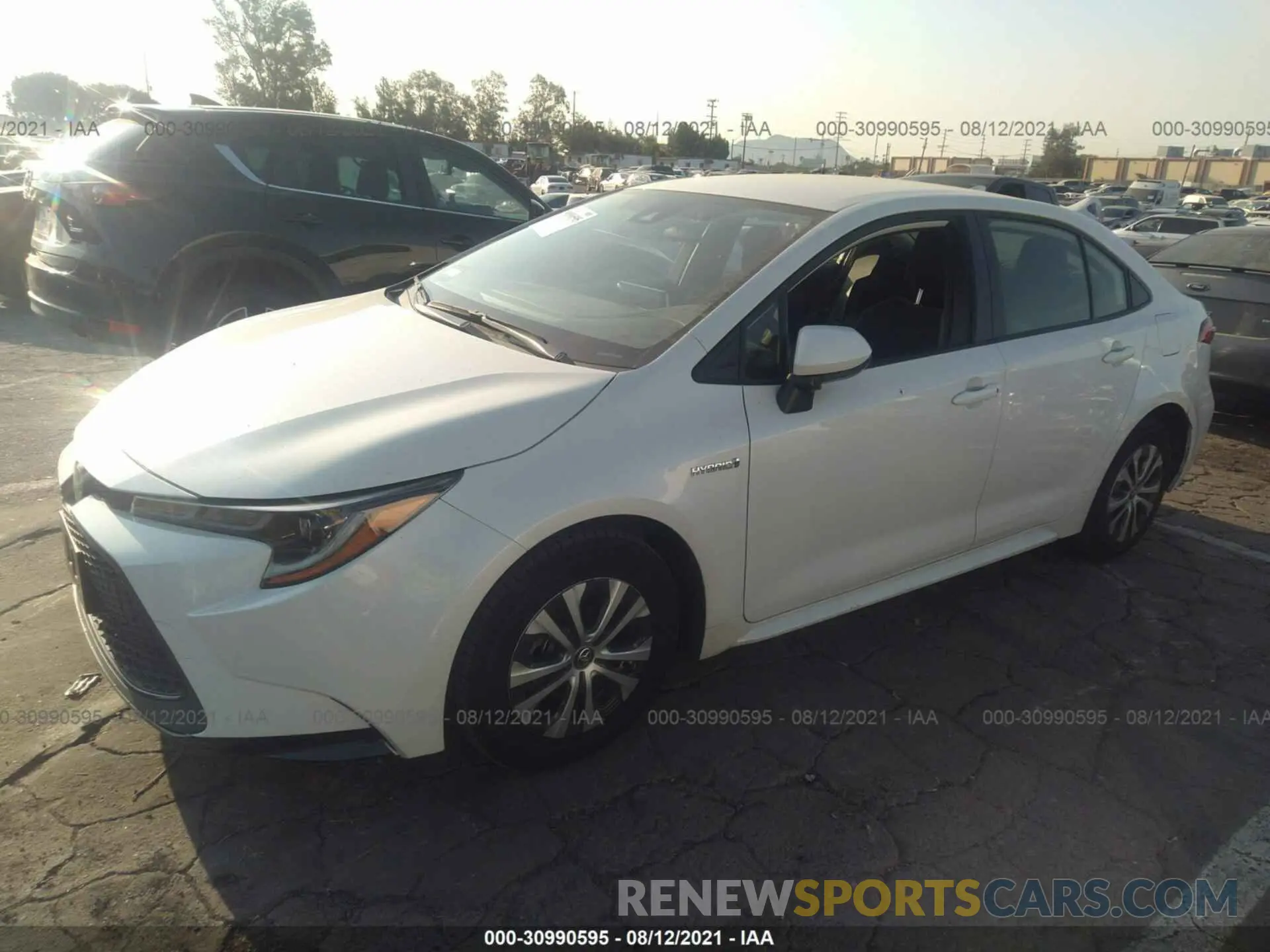 2 fotografías del automóvil dañado JTDEAMDE6MJ000519 TOYOTA COROLLA 2021