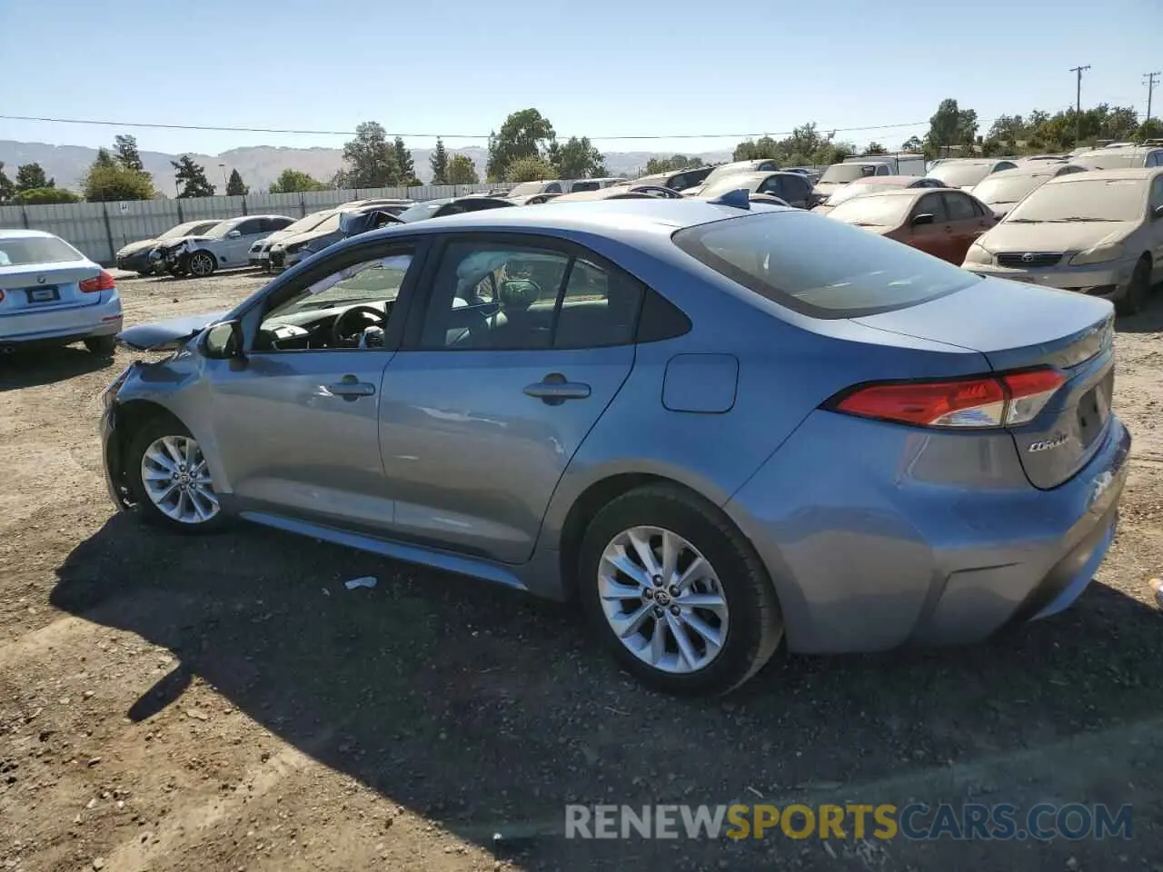 2 fotografías del automóvil dañado JTDVPMAEXMJ159983 TOYOTA COROLLA 2021