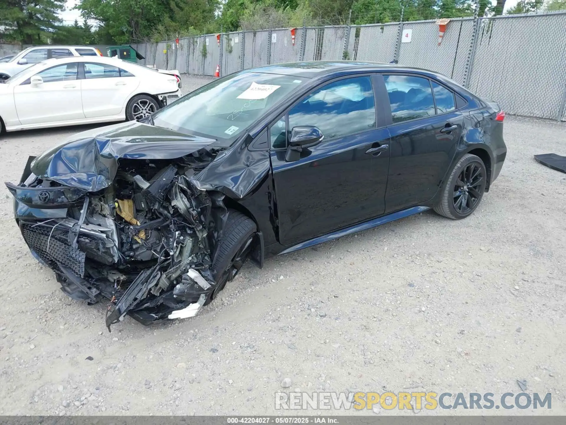 2 fotografías del automóvil dañado 5YFS4MCE6NP127683 TOYOTA COROLLA 2022